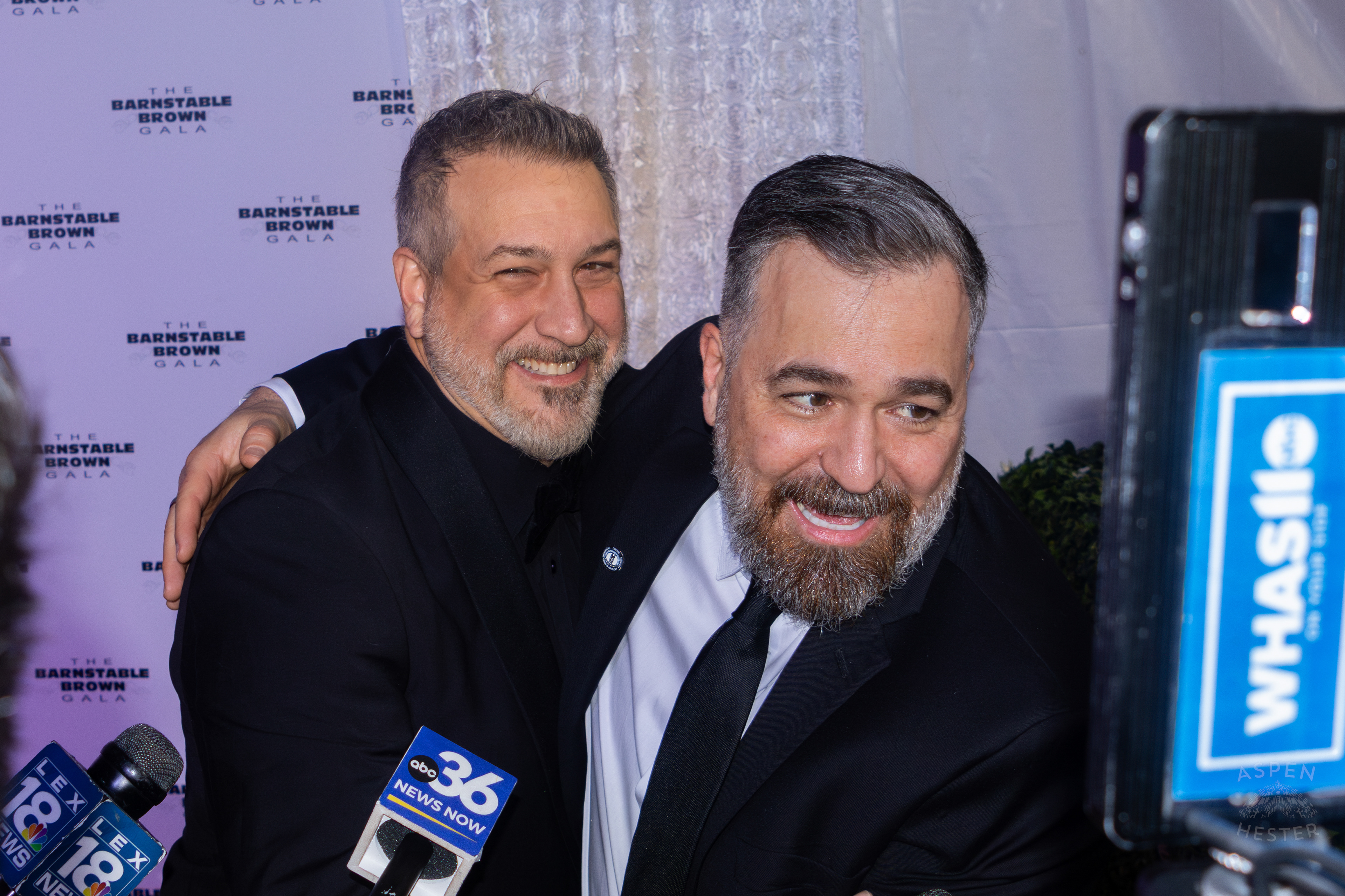 NSYNCs’ Joey Fatone and Impractical Jokers’ Q Hug on The Red Carpet at The 2025 Barnstable-Brown Gala. May 2nd, 2025/Aspen Hester