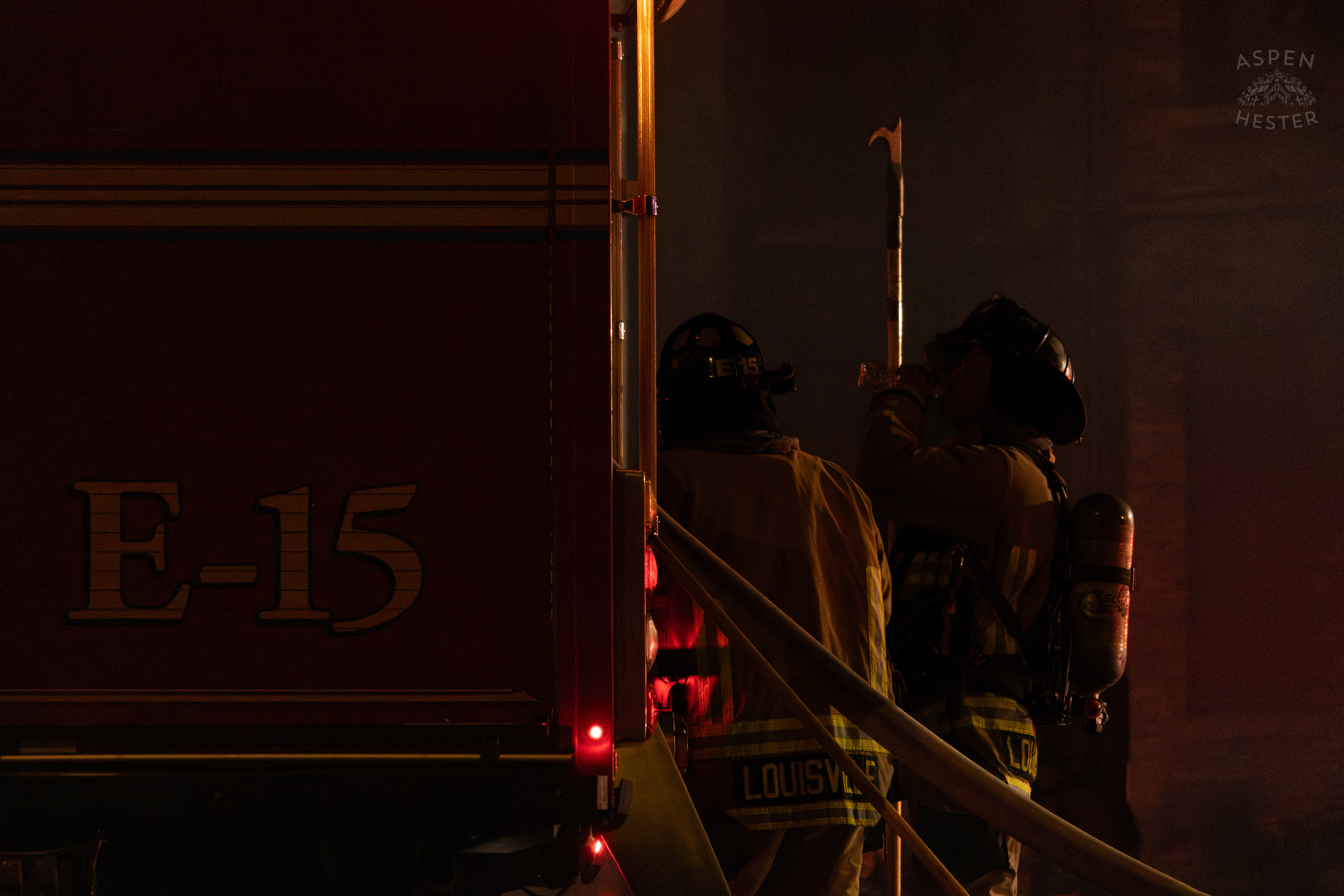 Firefighters Taking A Deserved Water Break On The Scene of A Massive 3 Alarm Blaze Engulfing The Vacant St. Paul's German Evangelical Church on East Broadway. October 9th, 2024/Aspen Hester