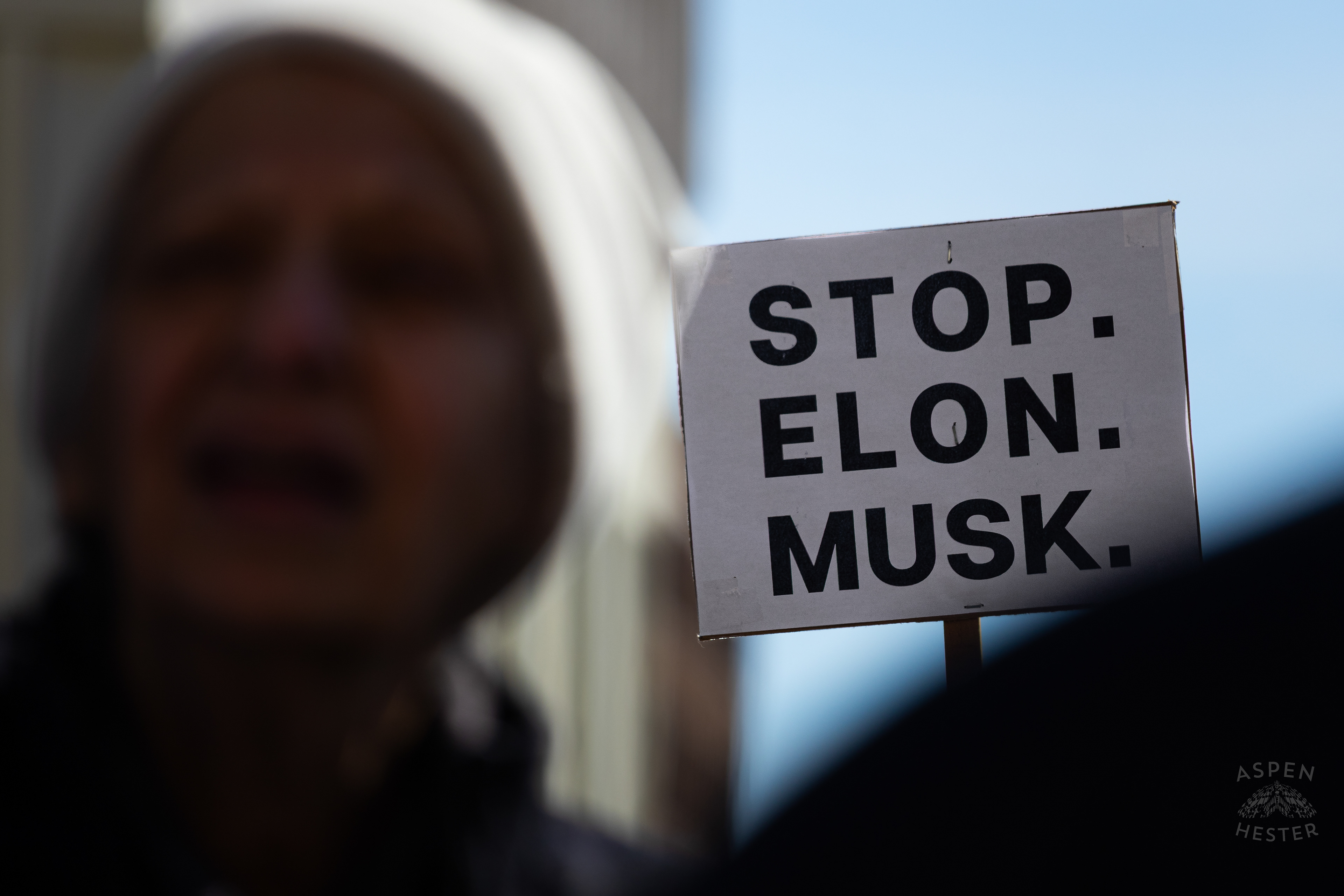 A Louisvillian Protesting The New Governmental Role of Elon Musk as The Community Rallies in Support of Ukraine. March 2nd, 2025/Aspen Hester