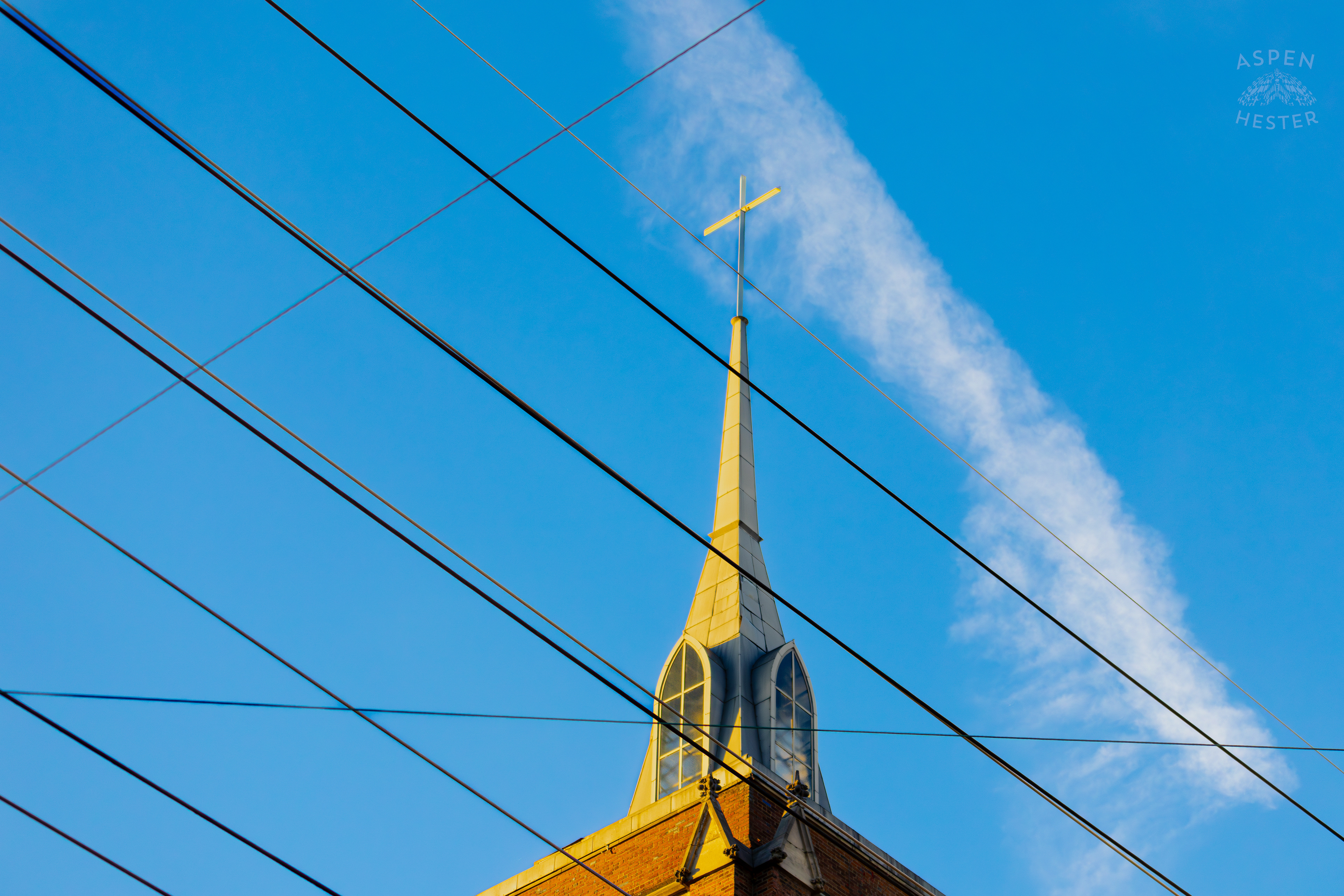 The Steeple of St. John United Church of Christ Against The Sky In Nulu on A Saturday Evening. November 14th, 2024/Aspen Hester