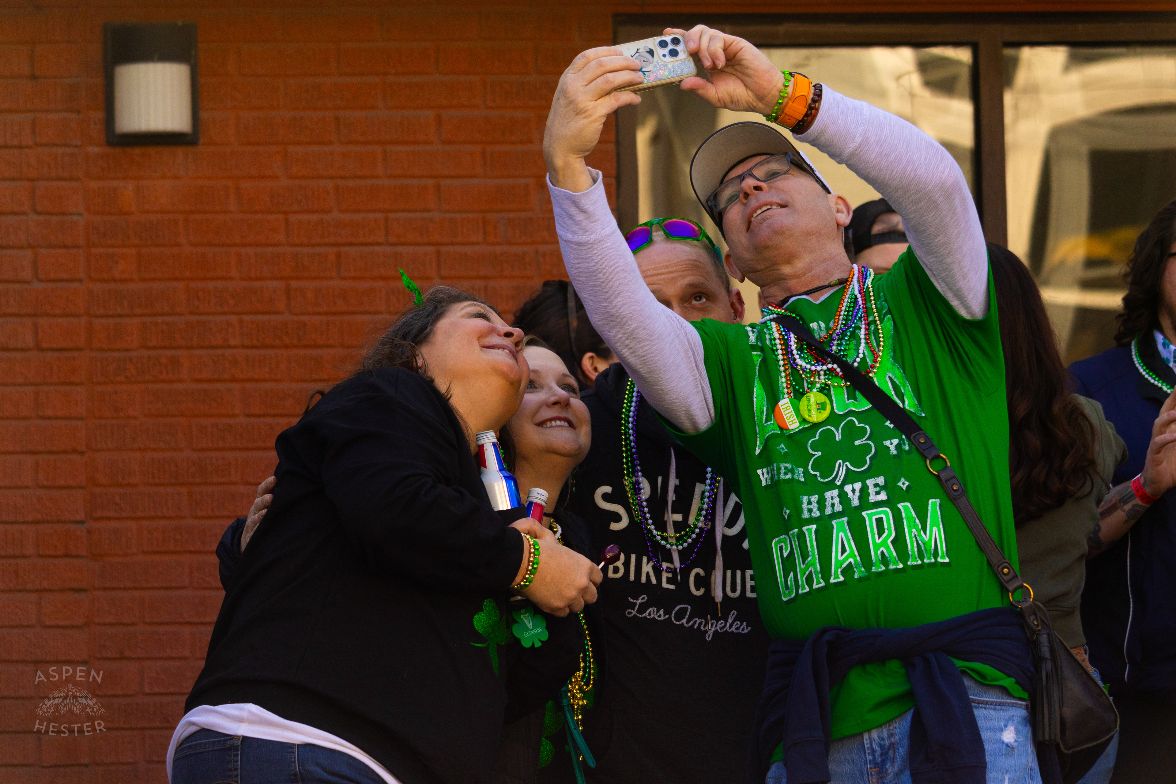 Spectators Take A Selfie as The 52nd Annual Saint Patrick’s Day Parade Rolls Through The Highlands. March 8th, 2025/Aspen Hester