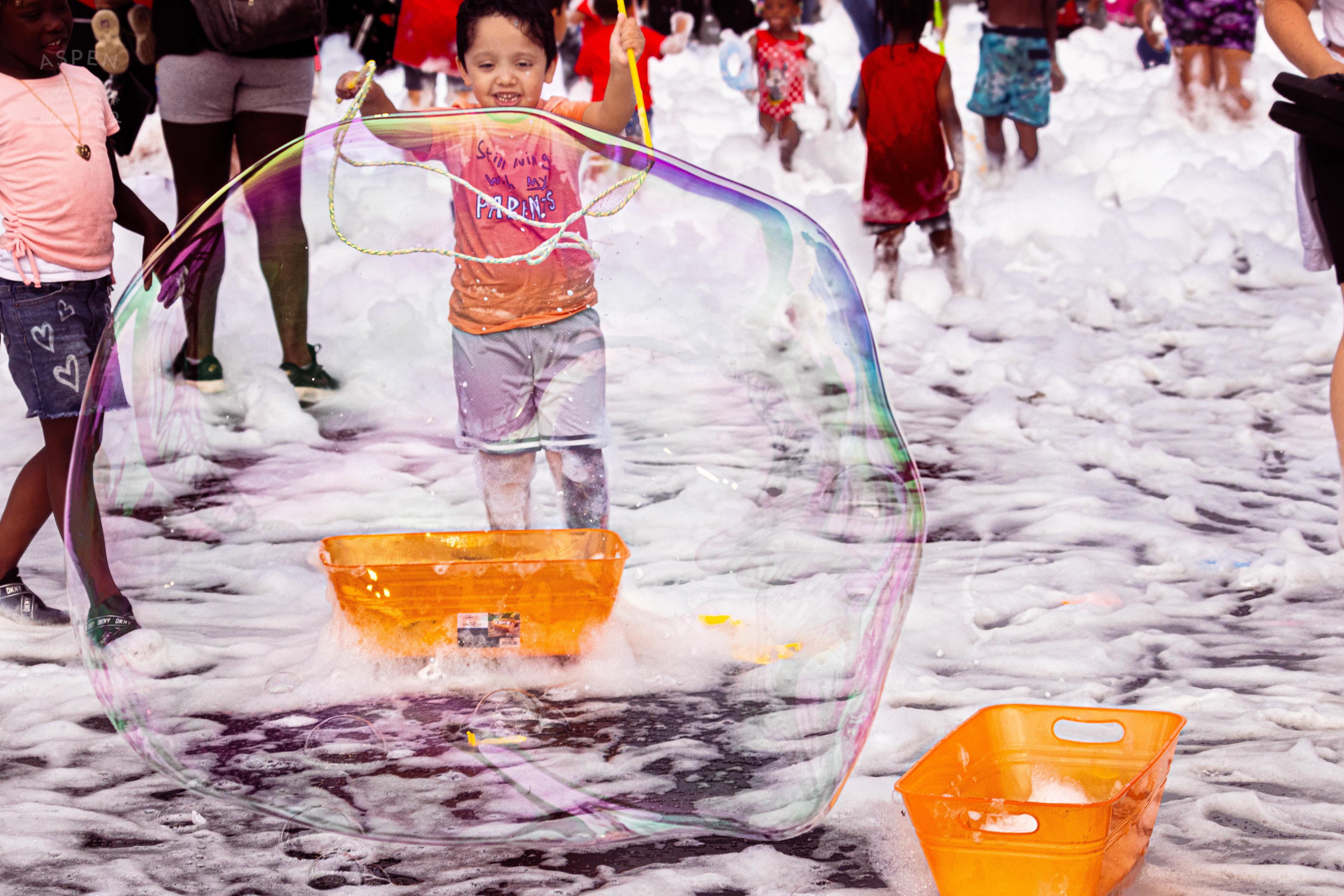 Kid Making Bubbles in the Bubble Party at Waterfront Park Fourth of July. July 4th, 2024/Aspen Hester