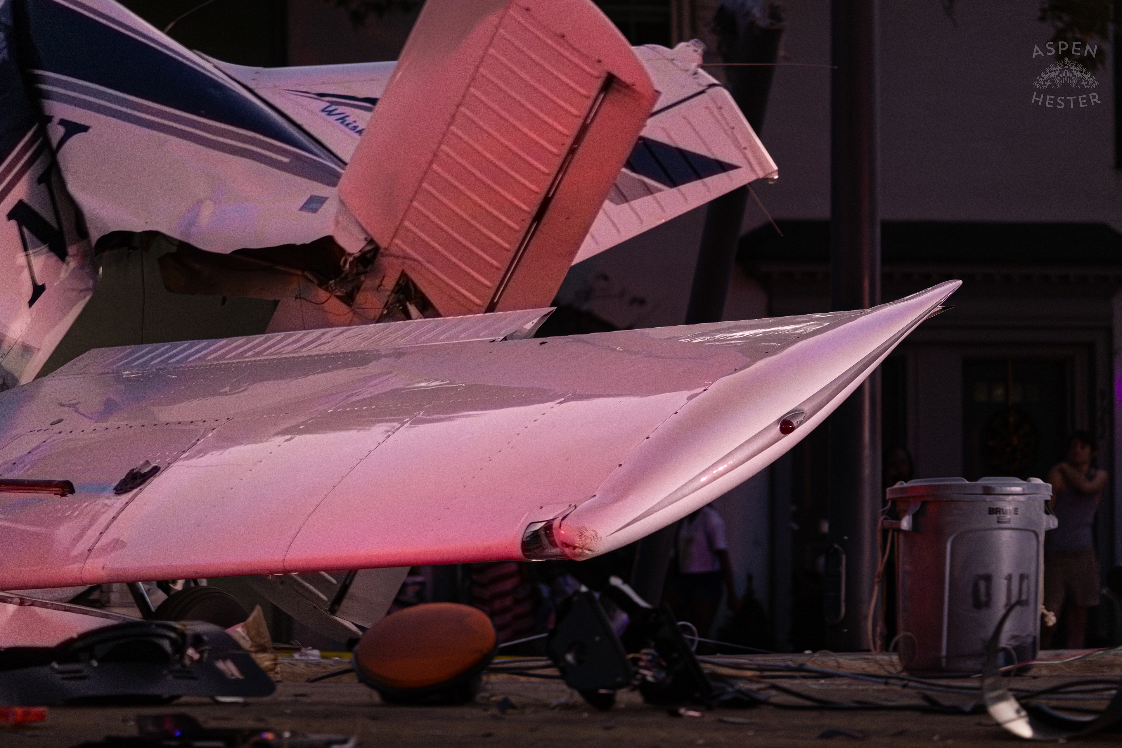 The Wing of A Piper Cherokee Plane Crumpled after it Crash Landed, Taking Out Utility Poles, and Hitting A Car on Breckenridge Lane and Kresge Way. October 11th, 2024/Aspen Hester 