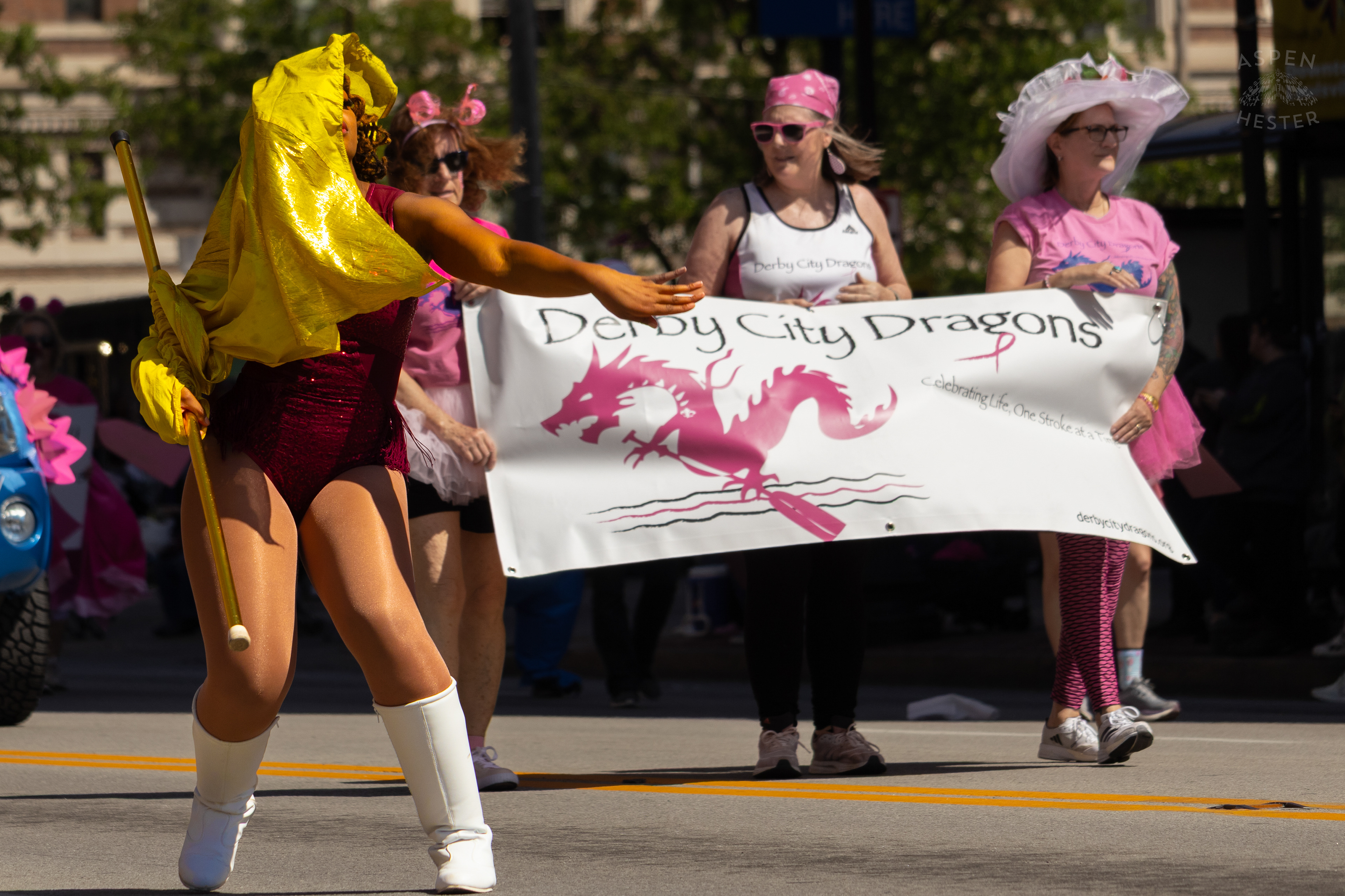 The Simmons College Marching Band Color Guard Dances Their Way Down West Broadway for The 70th Annual Pegasus Parade. April 27th, 2025/Aspen Hester