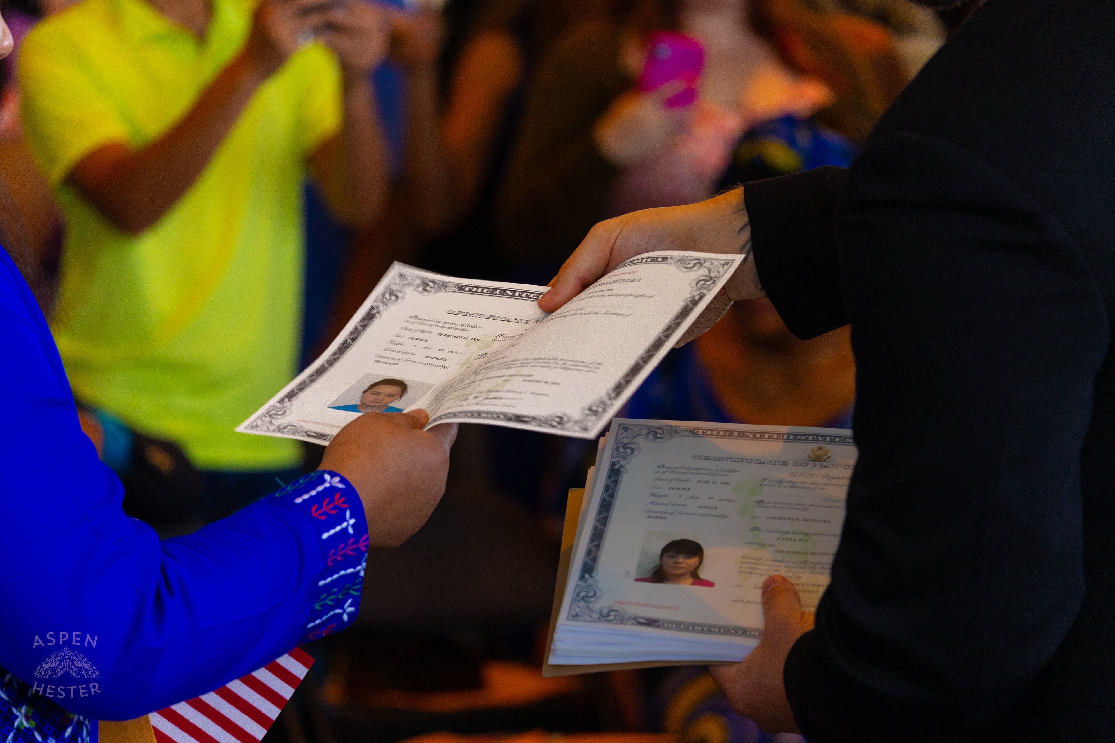 New American Citizens Receiving Their Certificates of Citizenship During WorldFest's Naturalization Ceremony. August 30th, 2024/Aspen Hester 
