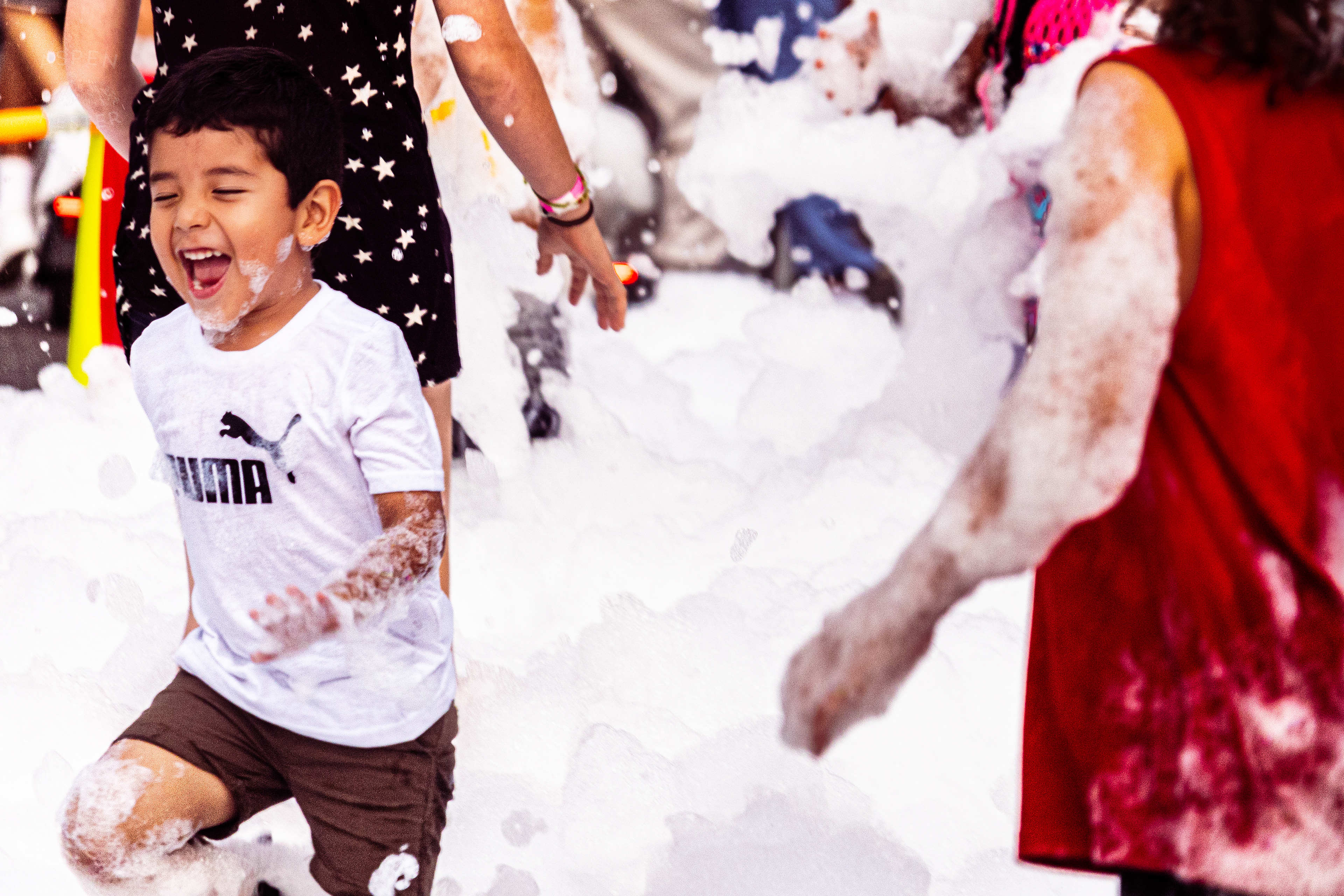 Kid Playing in the Bubble Party at Waterfront Park Fourth of July. July 4th, 2024/Aspen Hester