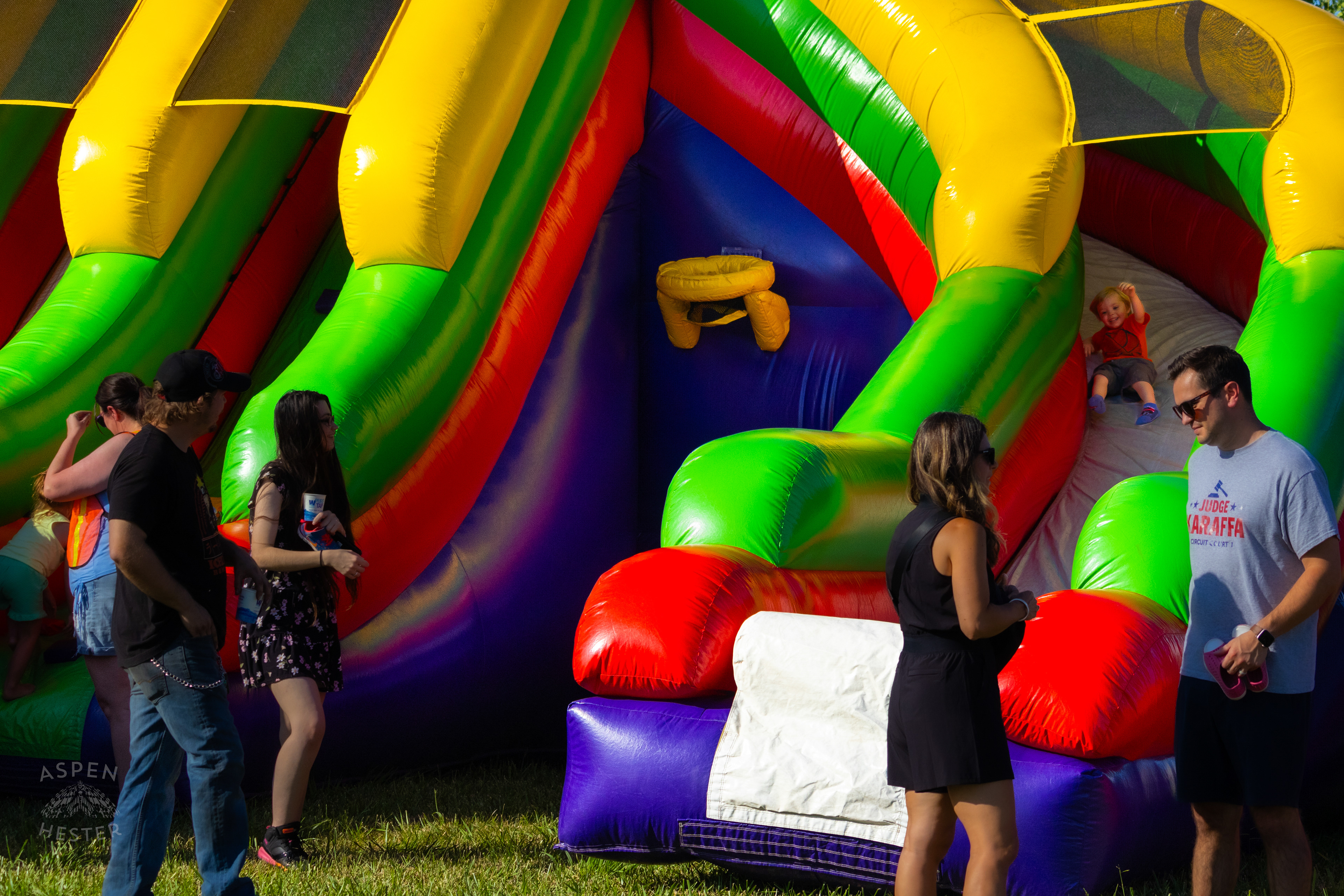 Kid Enjoying the Bouncy Slide at Play America with The Louisville Orchestra. July 5th, 2024/Aspen Hester