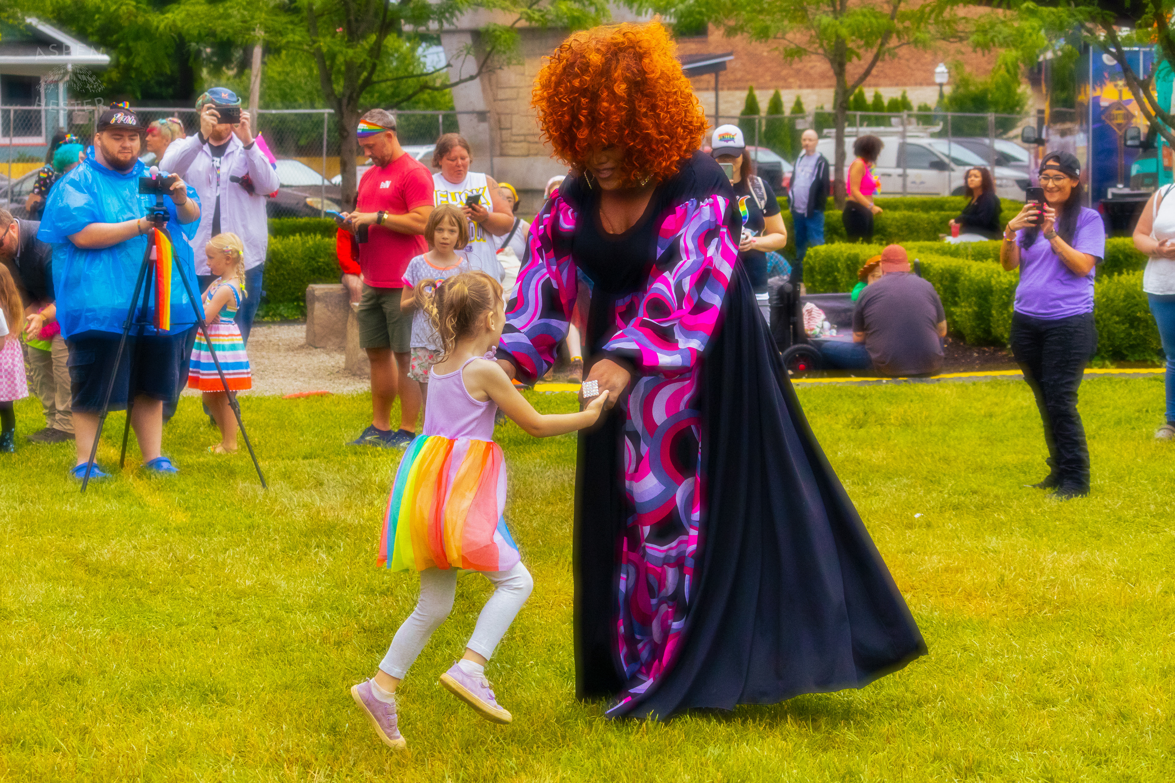 Drag Queen Dancing with A Kid from The Crowd While Performing 'Greatest Love of All' by Whitney Houston During Pride Bar's Family Friendly Drag Show at Southern Indiana Pride. June 1st, 2024/Aspen Hester