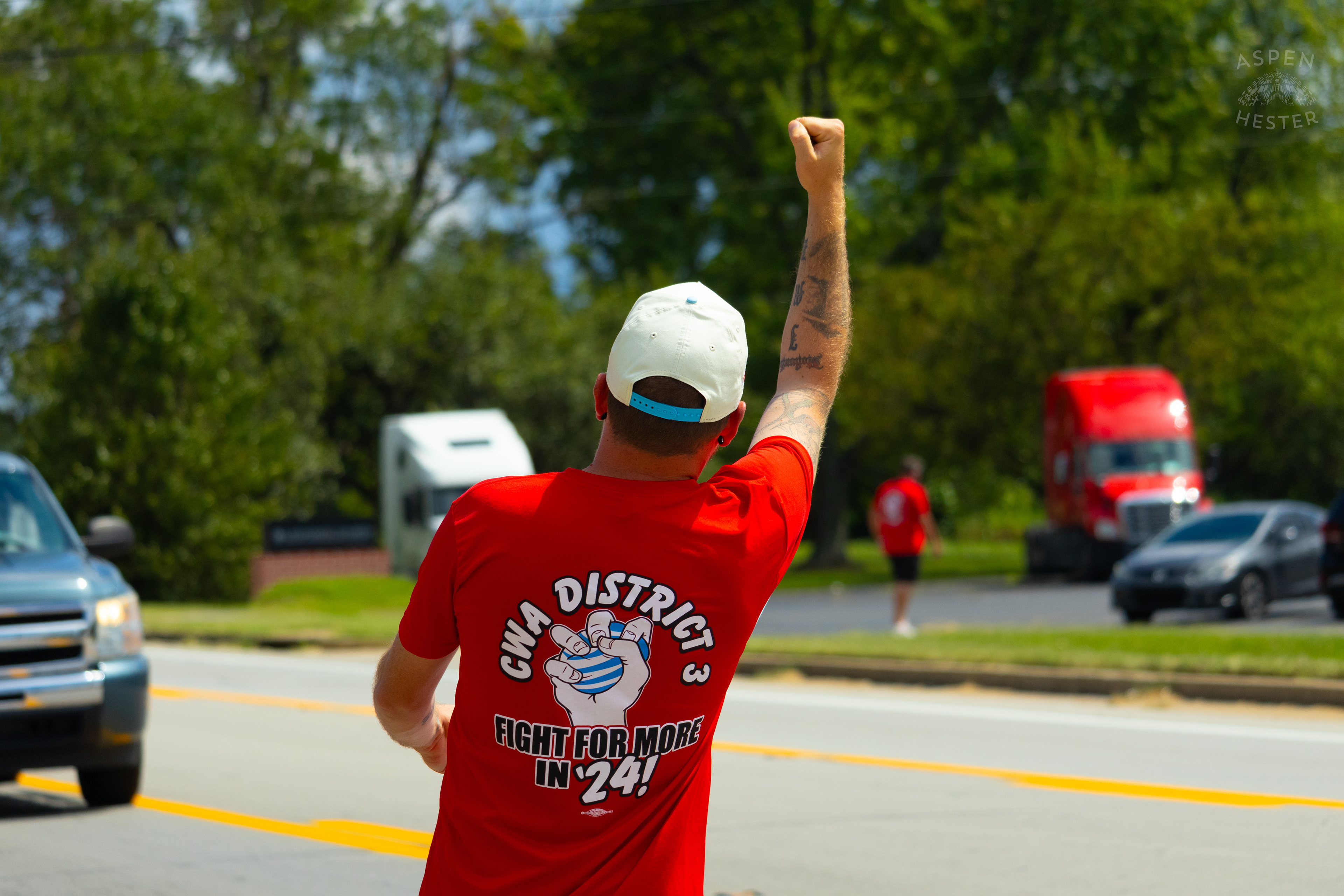 Member of The Communication Workers of America Union Encourages Cars to Honk in Support of Their  Strike Against AT&T for Fair Pay and Benefits. August 18th, 2024/Aspen Hester