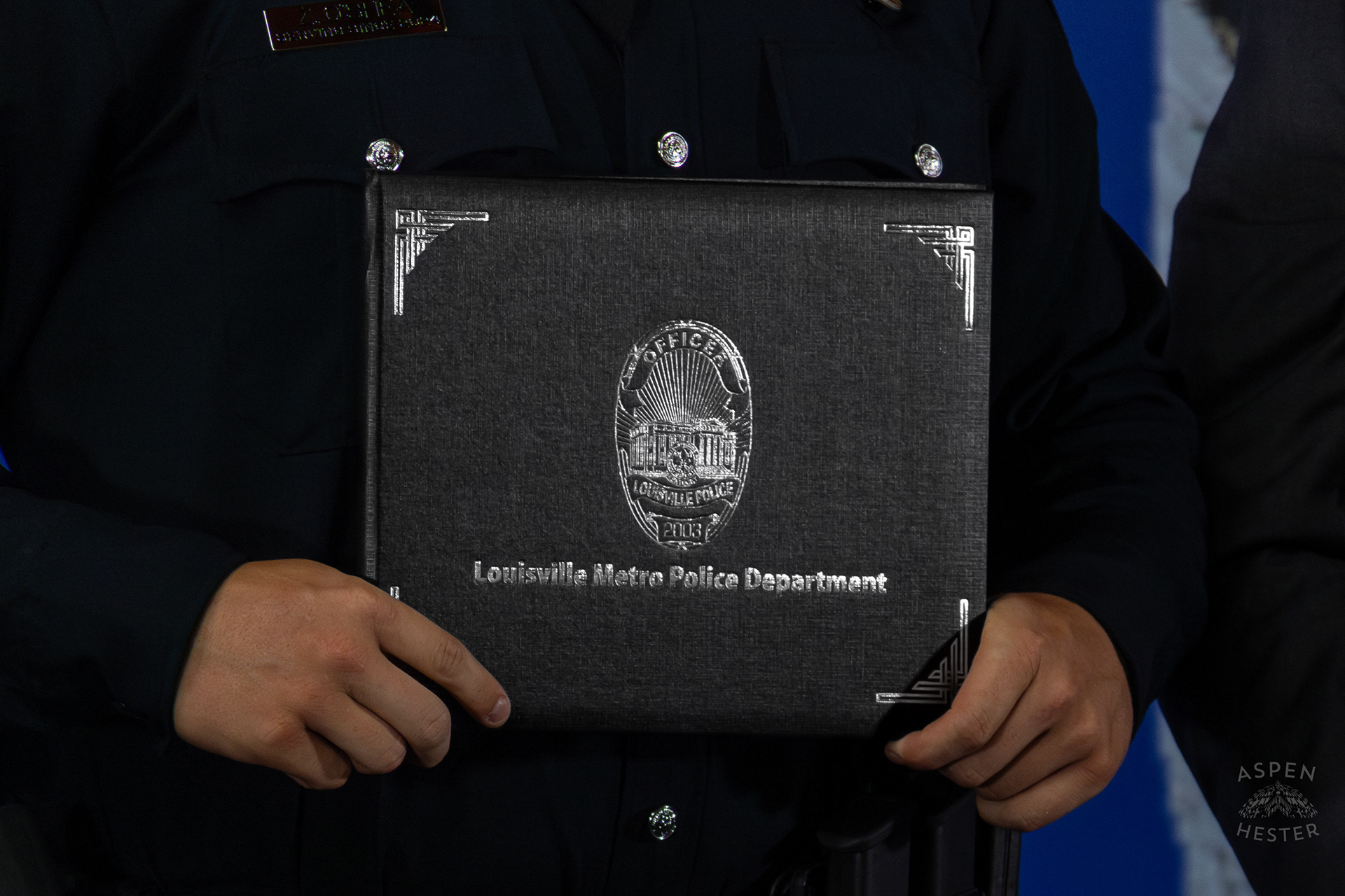 Officer Receiving Their Diploma at The Graduation of MAC 59 into LMPD. August 30th, 2024Aspen Hester