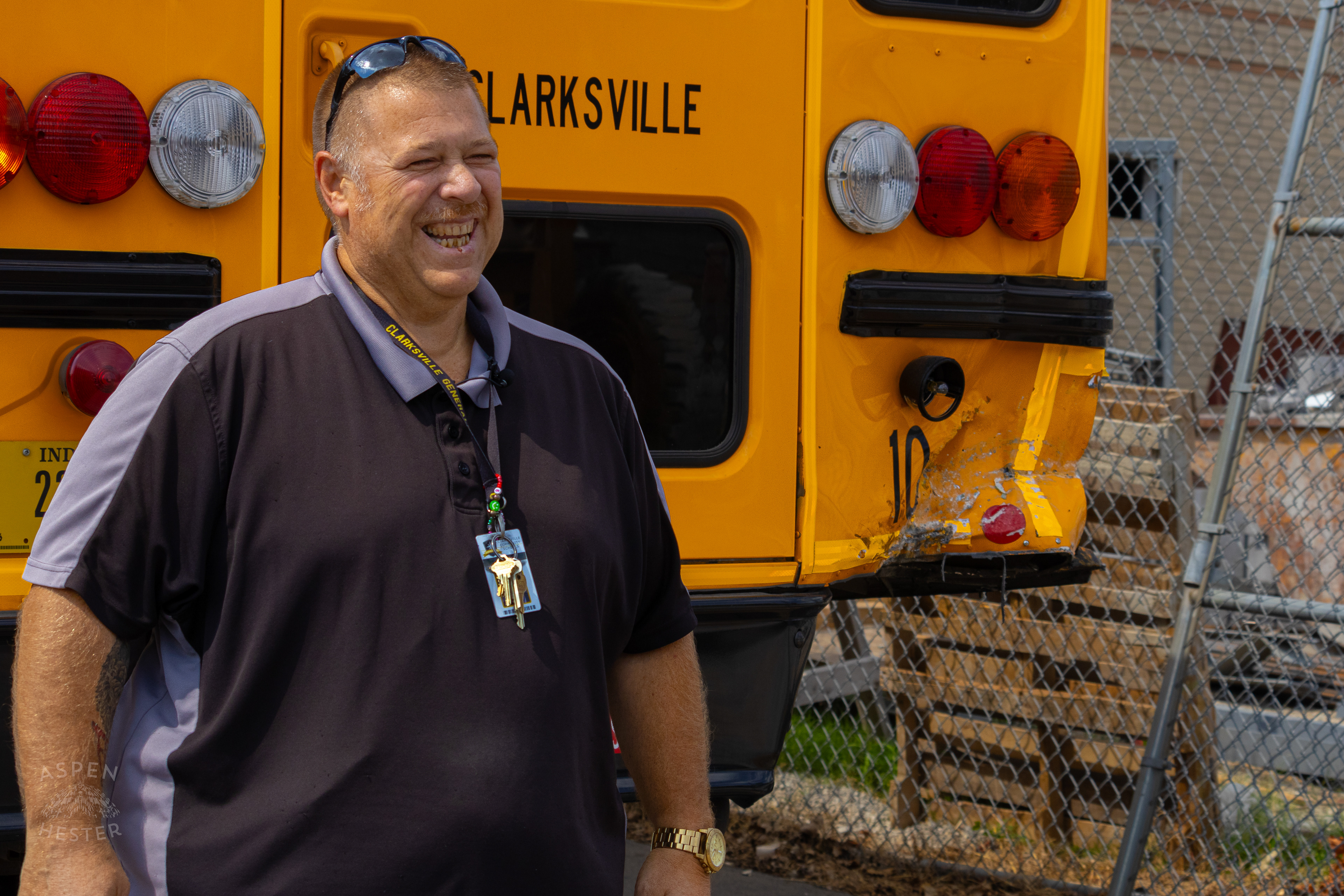 Michael Cain Next to The Clarksville Community School Cooperation Bus He Was Driving After A Dodge Charger Crashed into it at Full Speed. August 14th, 2024/Aspen Hester