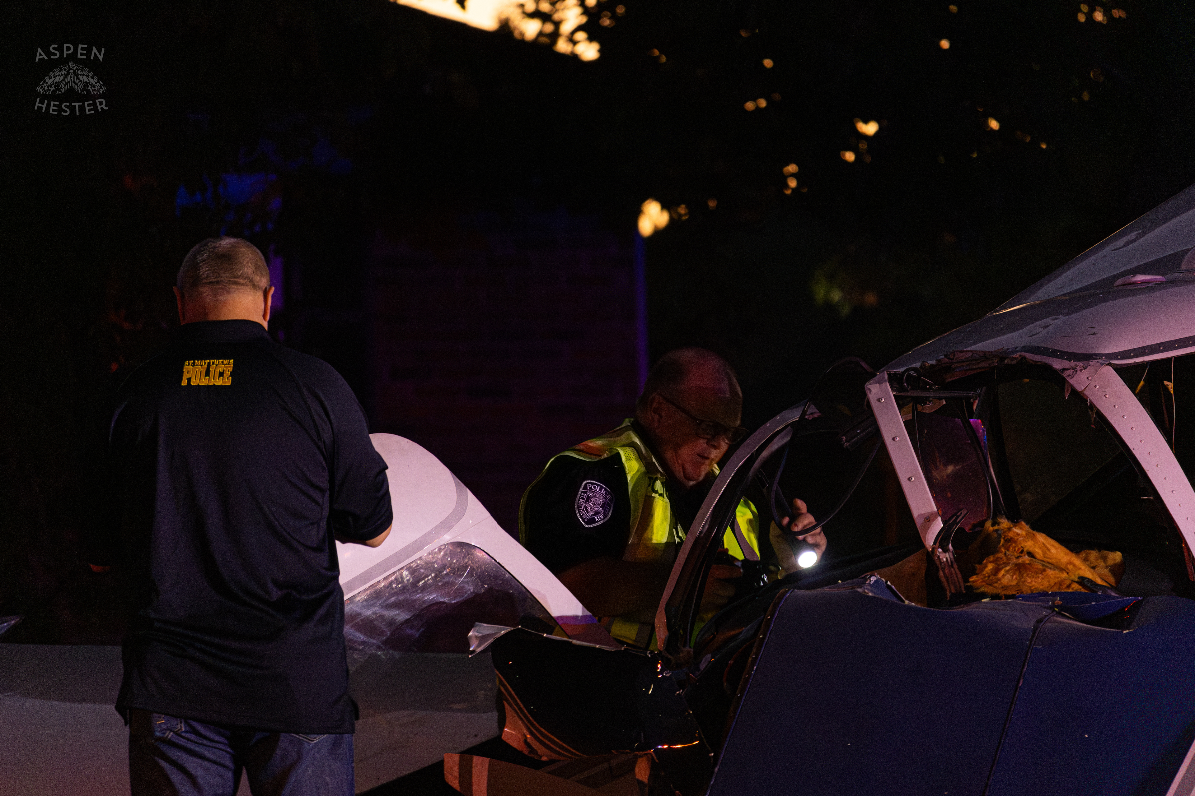 Police Investigating The Scene Where A Piper Cherokee Plane Crash Landed, Taking Out Utility Poles, and Hitting A Car on Breckenridge Lane and Kresge Way. October 11th, 2024/Aspen Hester 