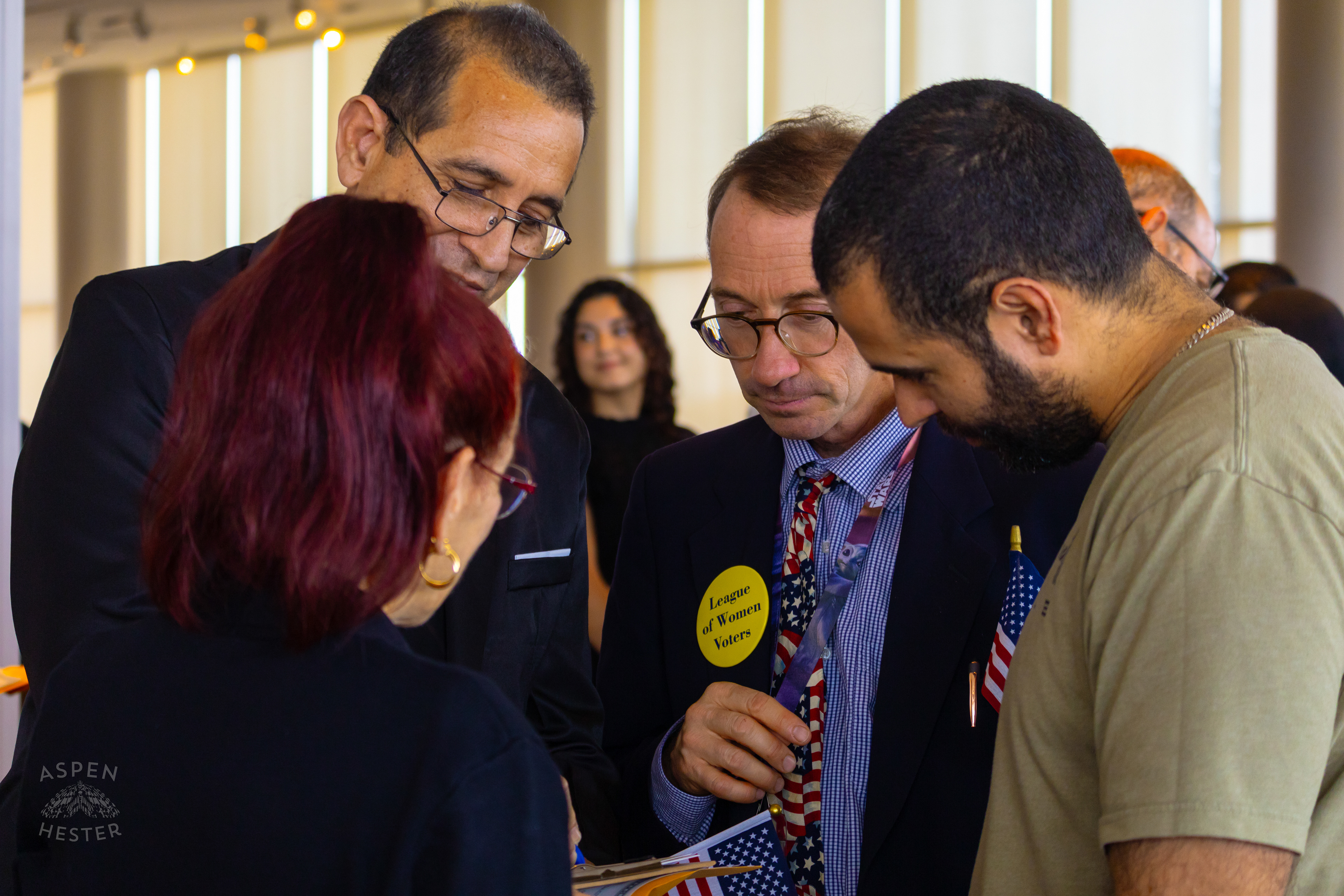 Migrants Register to Vote After Becoming American Citizens During WorldFest's Naturalization Ceremony. August 30th, 2024/Aspen Hester