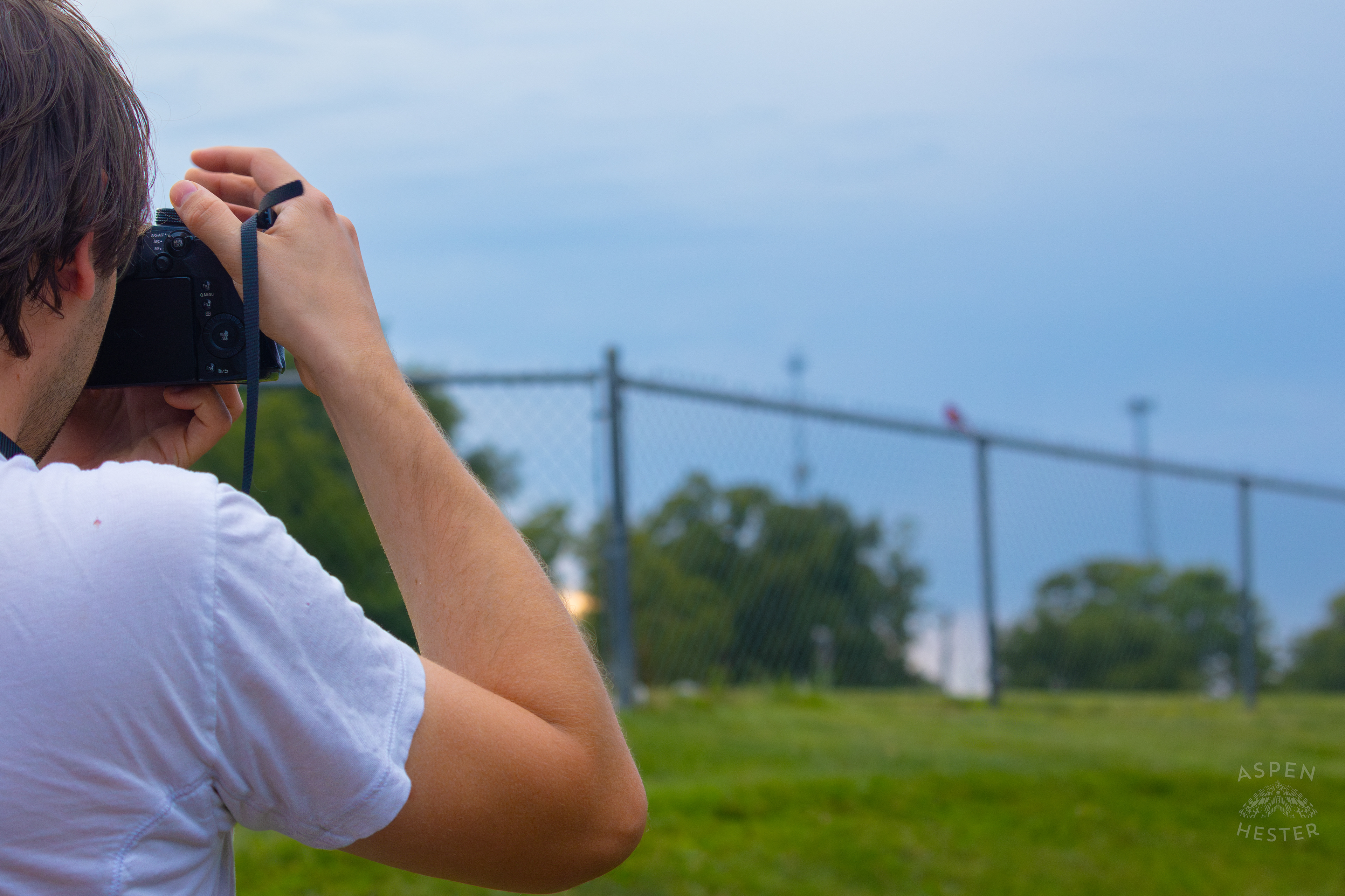 Photographing A Cardenal in Wendell Moore Park. August 12th, 2024/Aspen Hester