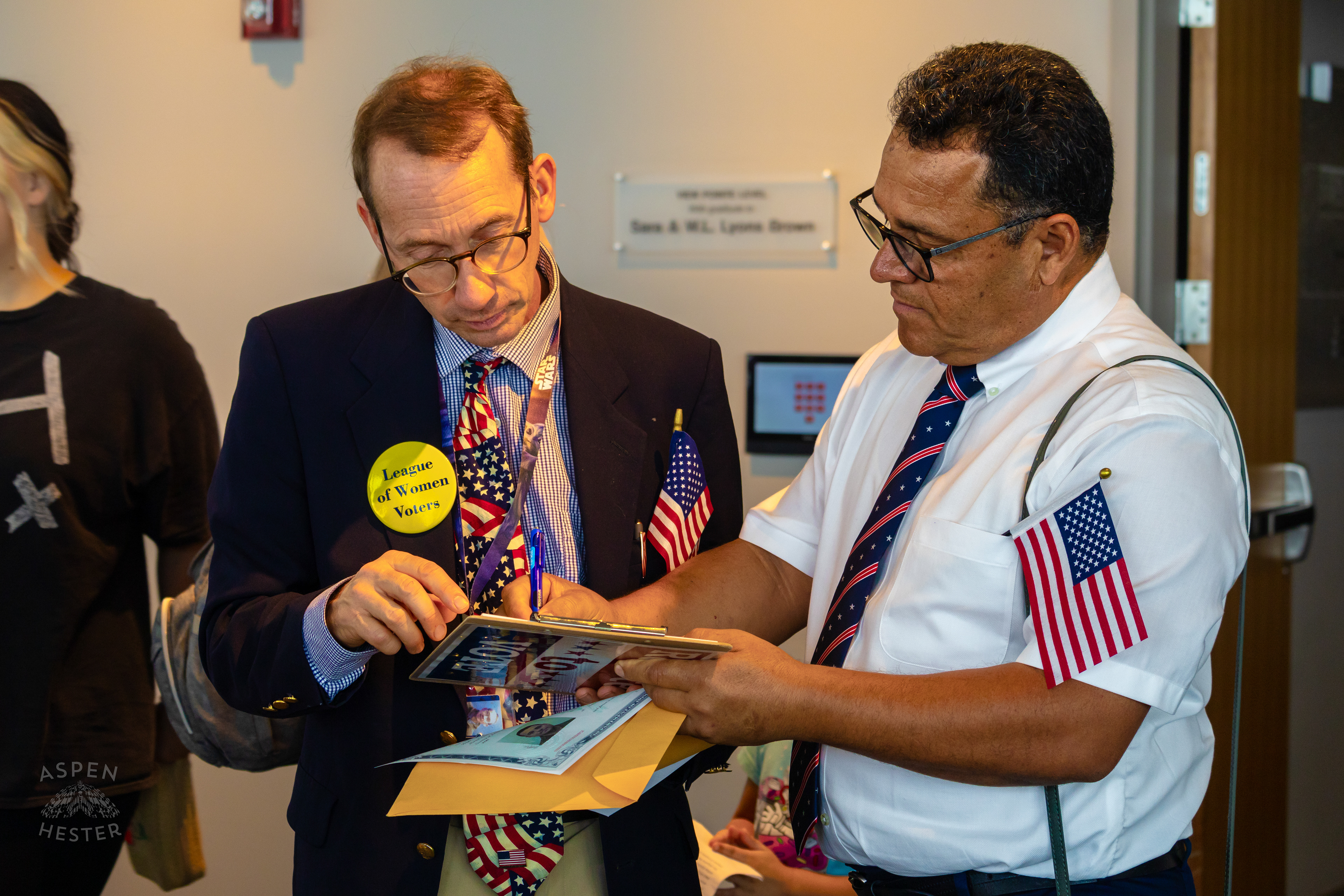 Jose Castro from Peru Registers to Vote After Becoming An American Citizen During WorldFest's Naturalization Ceremony. August 30th, 2024/Aspen Hester