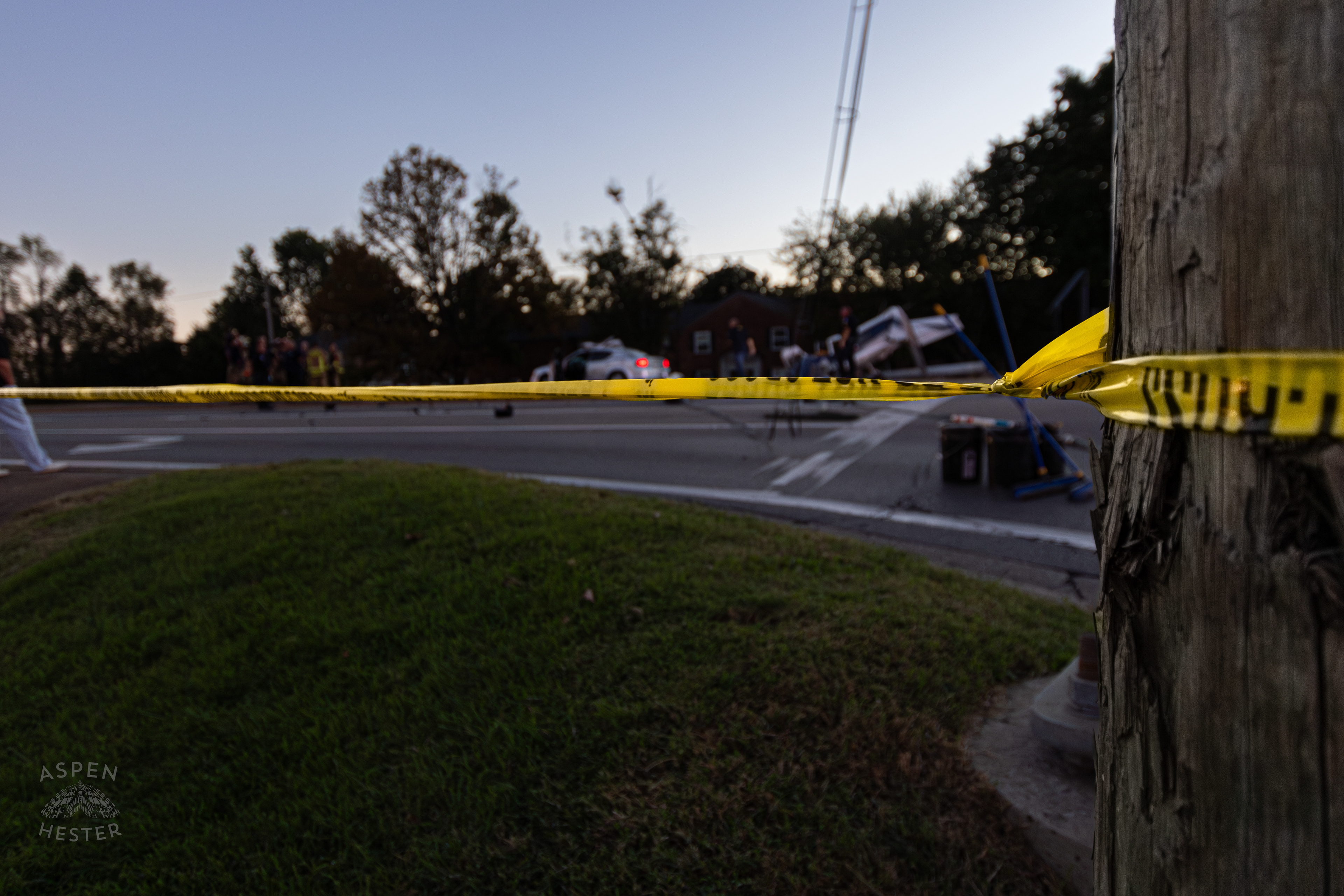 Crime Scene Tape Marking Where A Piper Cherokee Plane Crash Landed, Taking Out Utility Poles, and Hitting A Car on Breckenridge Lane and Kresge Way. October 11th, 2024/Aspen Hester 