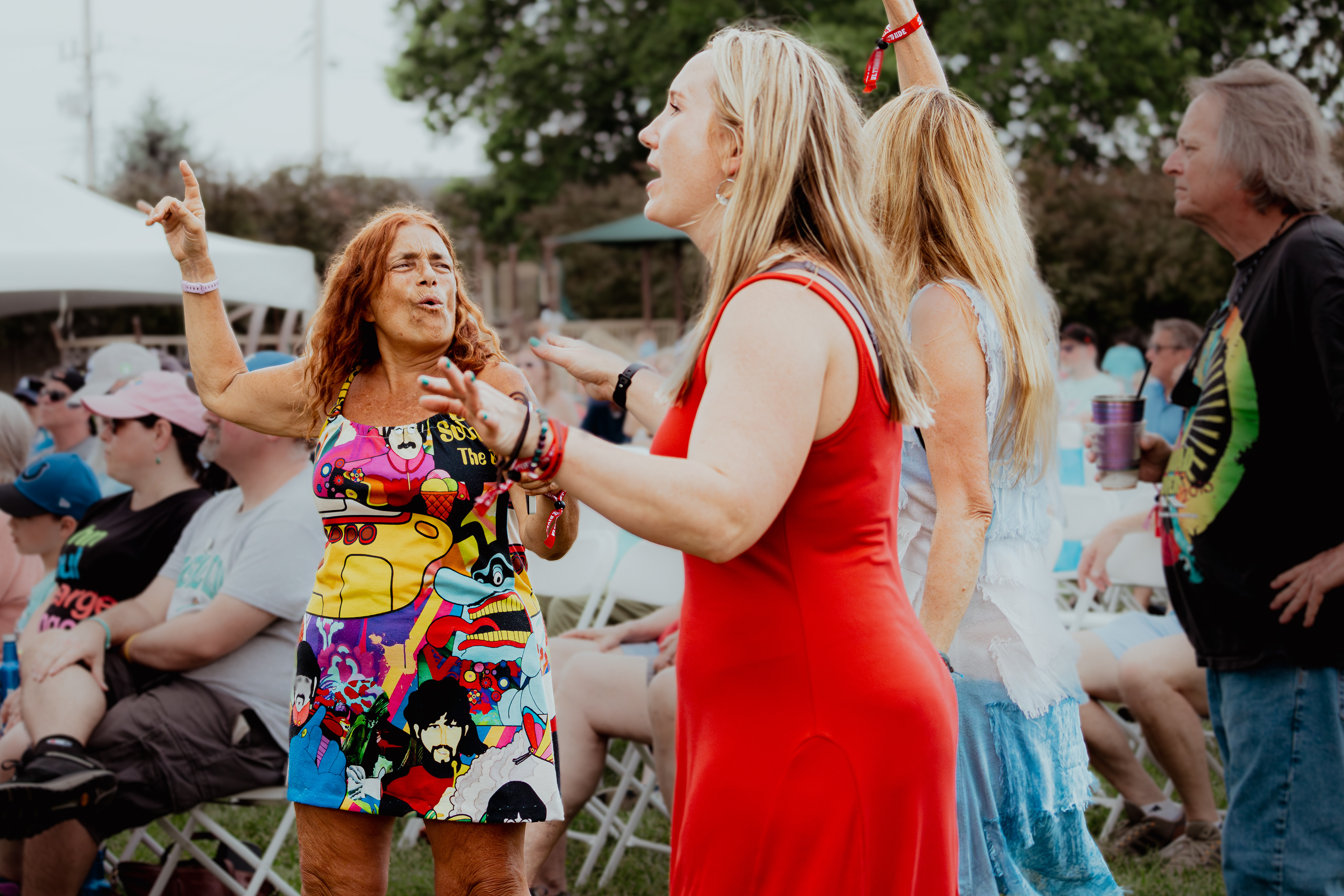 People Enjoying the Music at Abbey Road on The River. May 25th, 2024/Aspen Hester