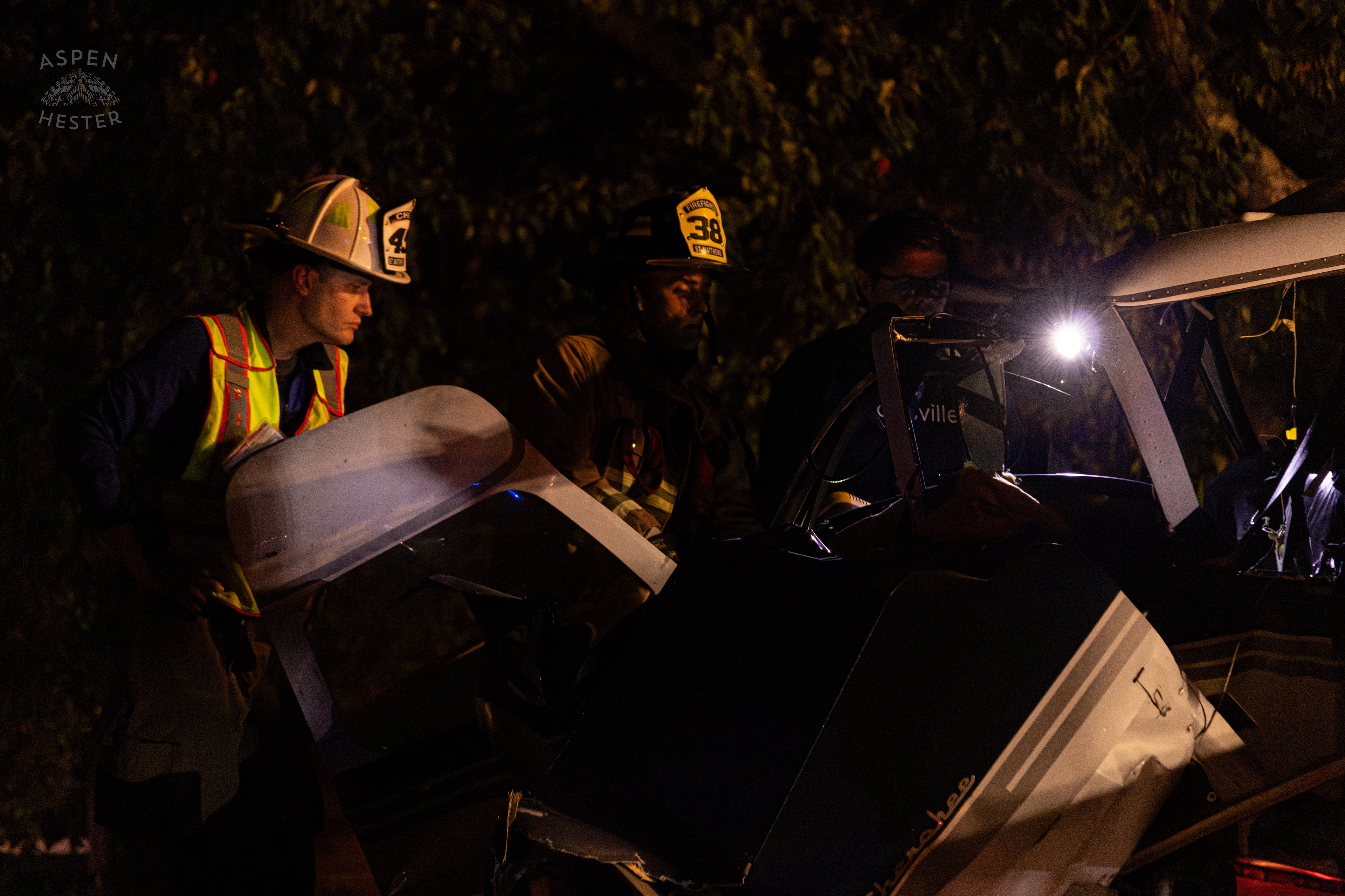 Police Investigating The Piper Cherokee Plane after it Crash Landed, Taking Out Utility Poles, and Hitting A Car on Breckenridge Lane and Kresge Way. October 11th, 2024/Aspen Hester 