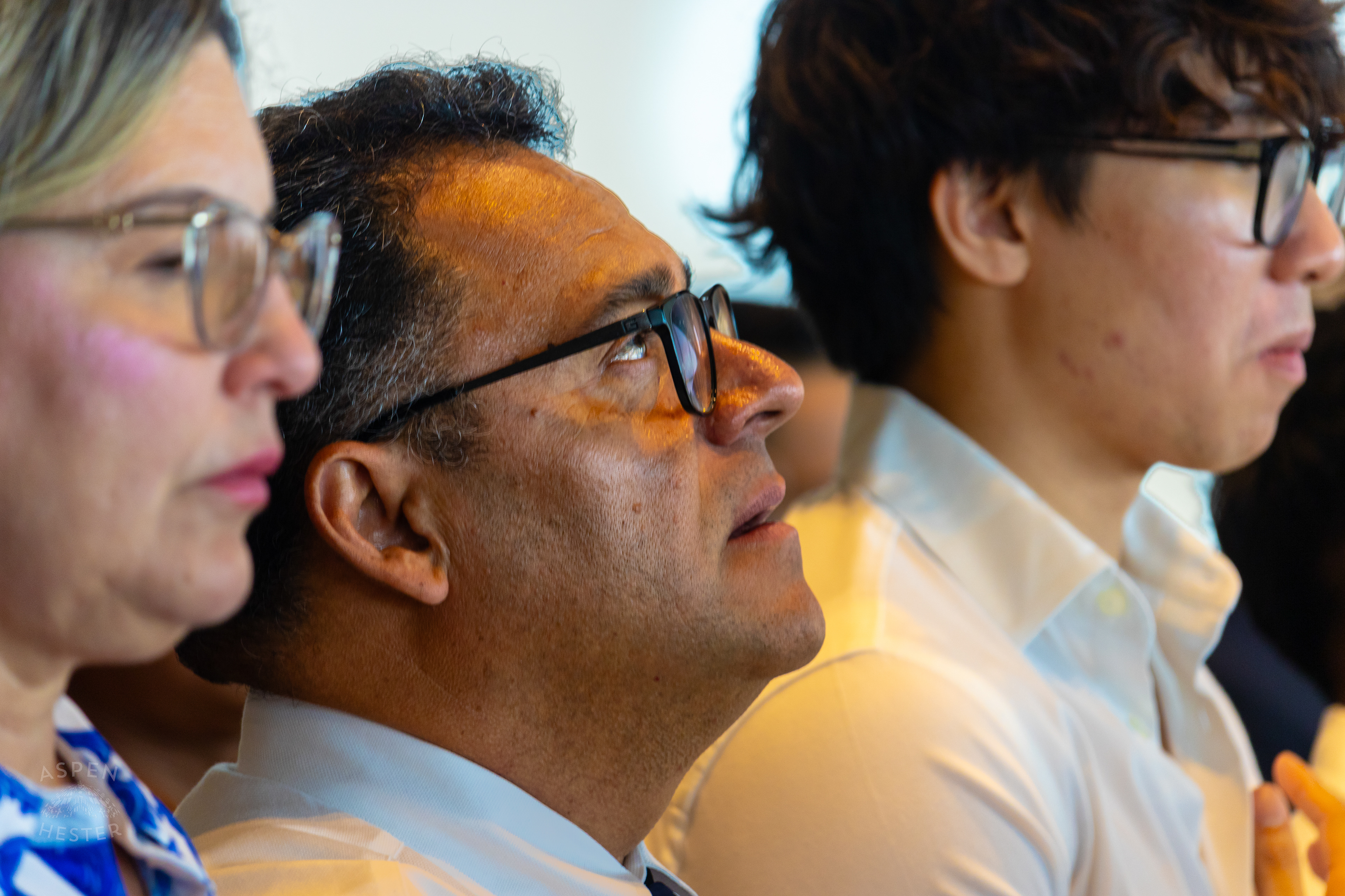 Jose Castro from Peru Mouths Along to The Star Spangled Banner During WorldFest's Naturalization Ceremony. August 30th, 2024/Aspen Hester