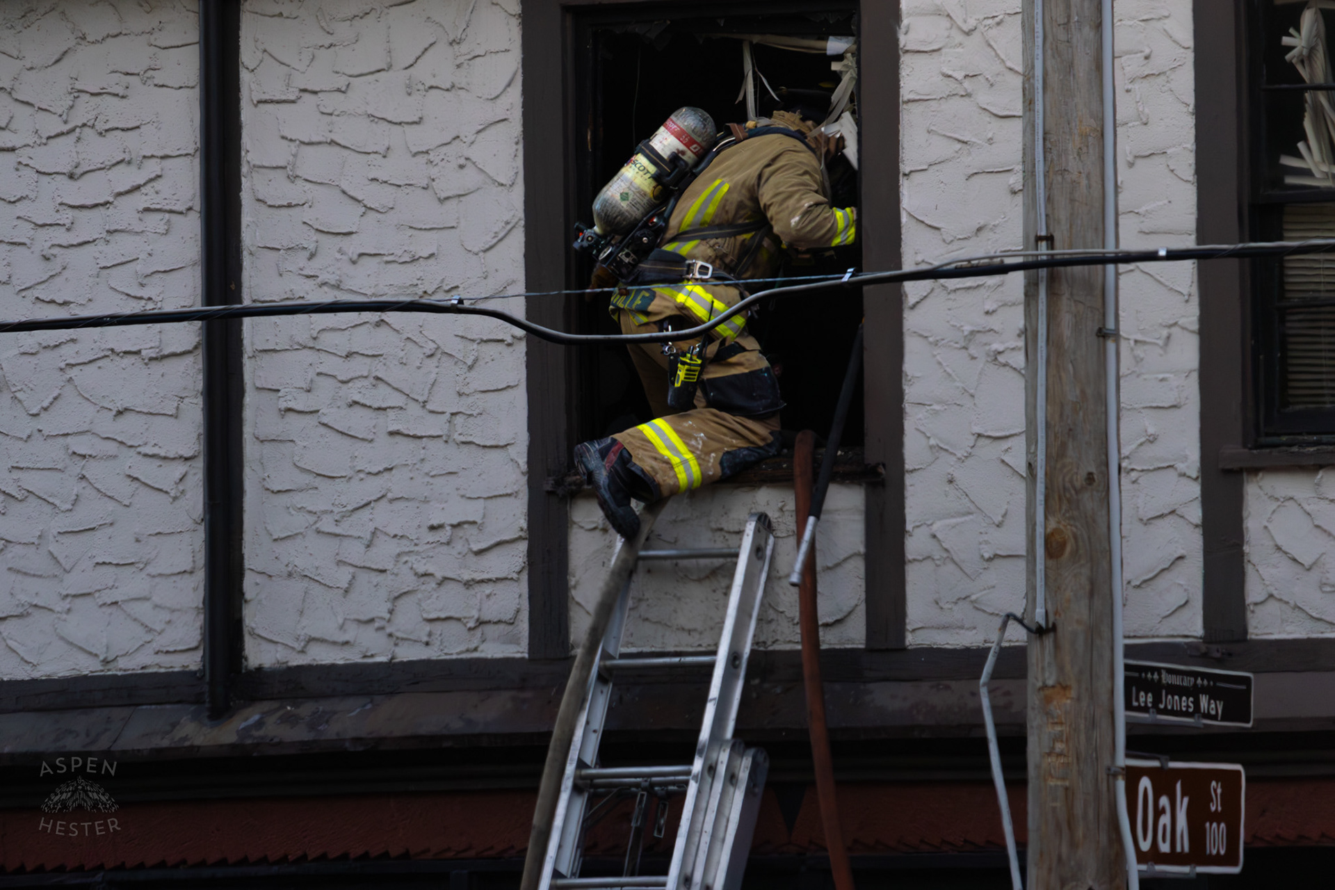 Louisville Firefighter Entering Burning Building on The Corner of 2nd and Oak Street. June 7th, 2024/Aspen Hester