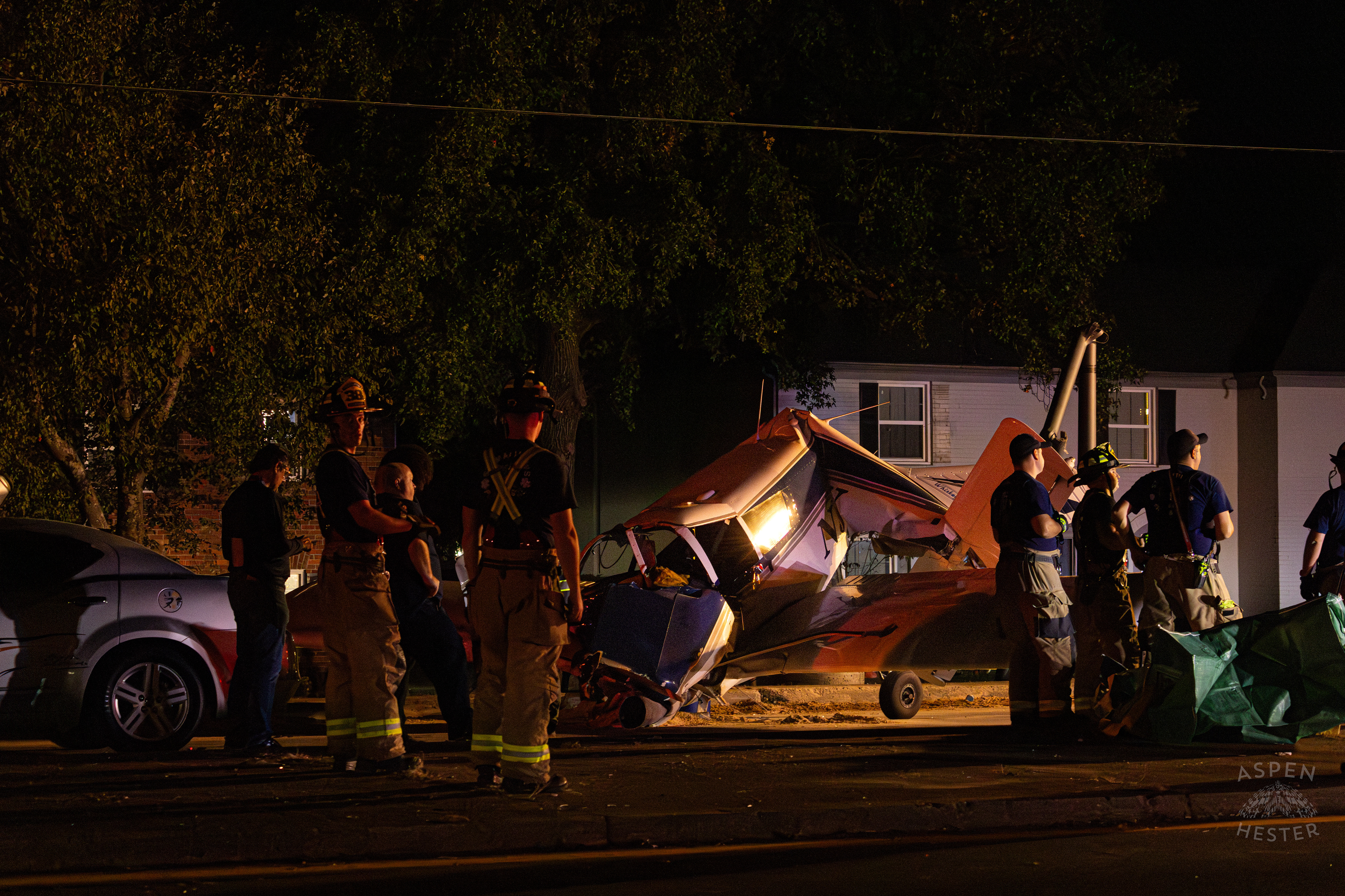 St. Matthews Firefighters Watching Over The Scene Where A Piper Cherokee Plane Crash Landed, Taking Out Utility Poles, and Hitting A Car on Breckenridge Lane and Kresge Way. October 11th, 2024/Aspen Hester 