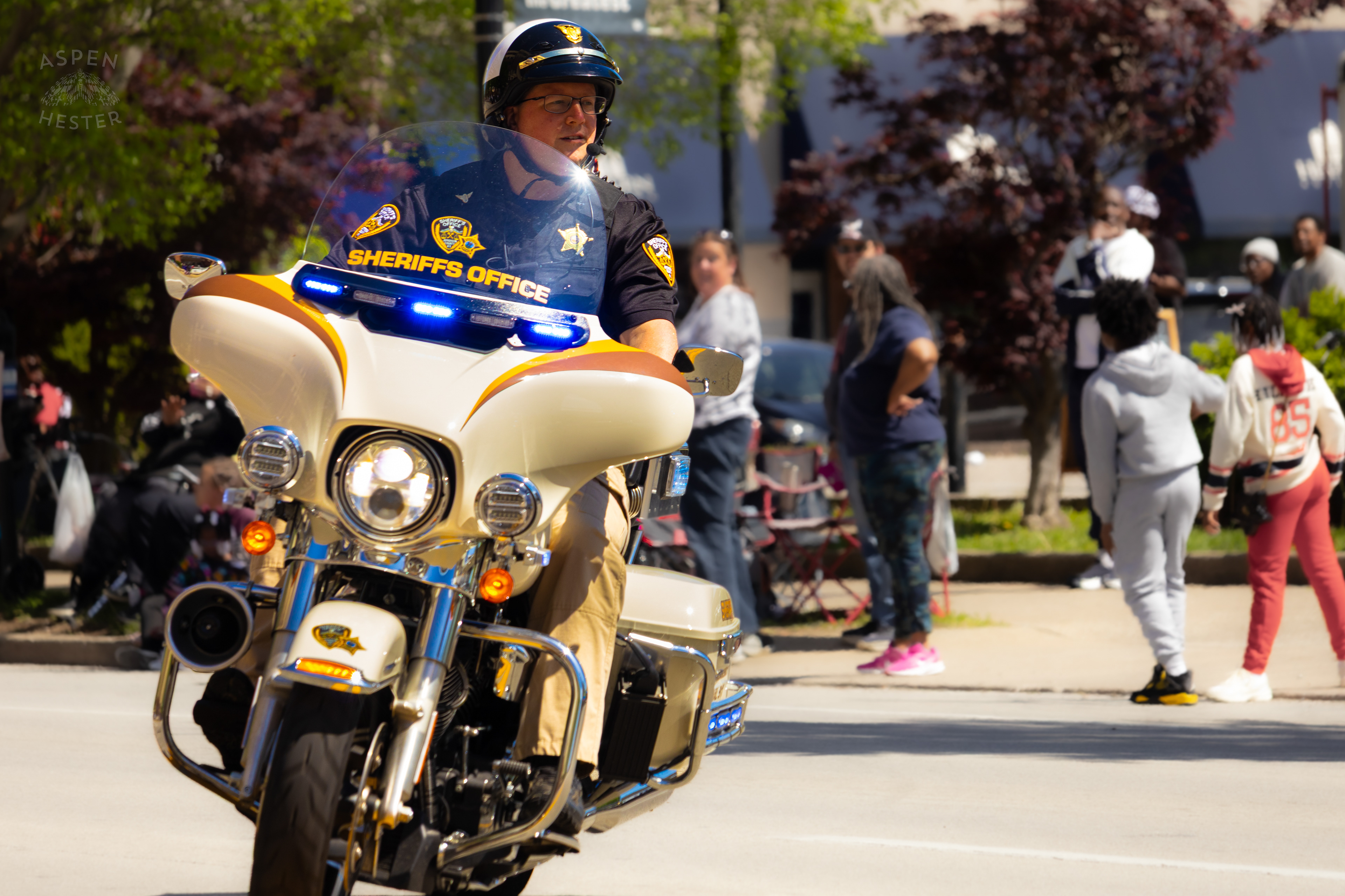 A Motor Officer for The Jefferson County Sheriff's Office Rides Down West Broadway During The 70th Annual Pegasus Parade. April 27th, 2025/Aspen Hester