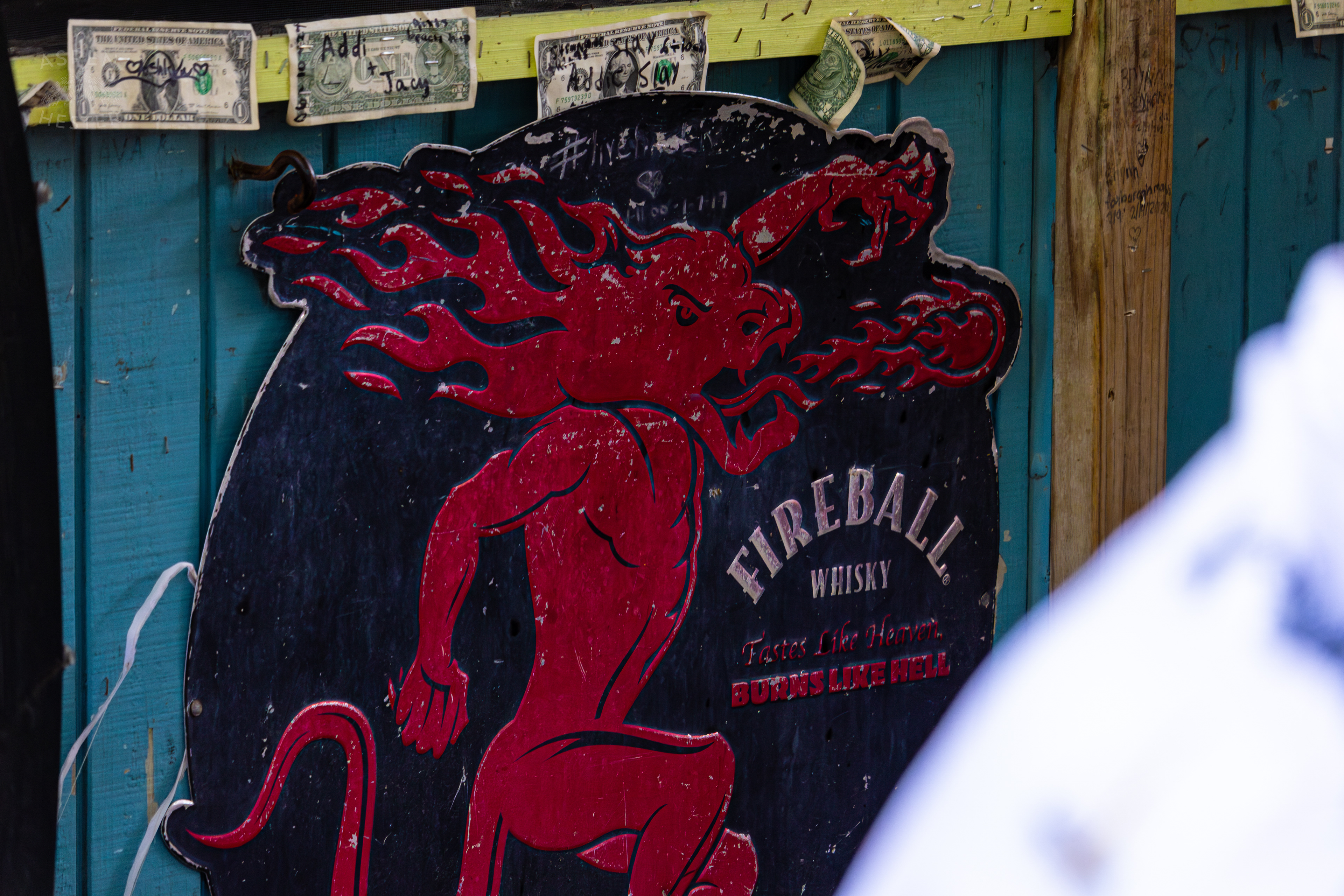 Dollar Bills Stapled to Huc-A-Poos Bites and Booze on Tybee Island Georgia. June 25th, 2024/Aspen Hester