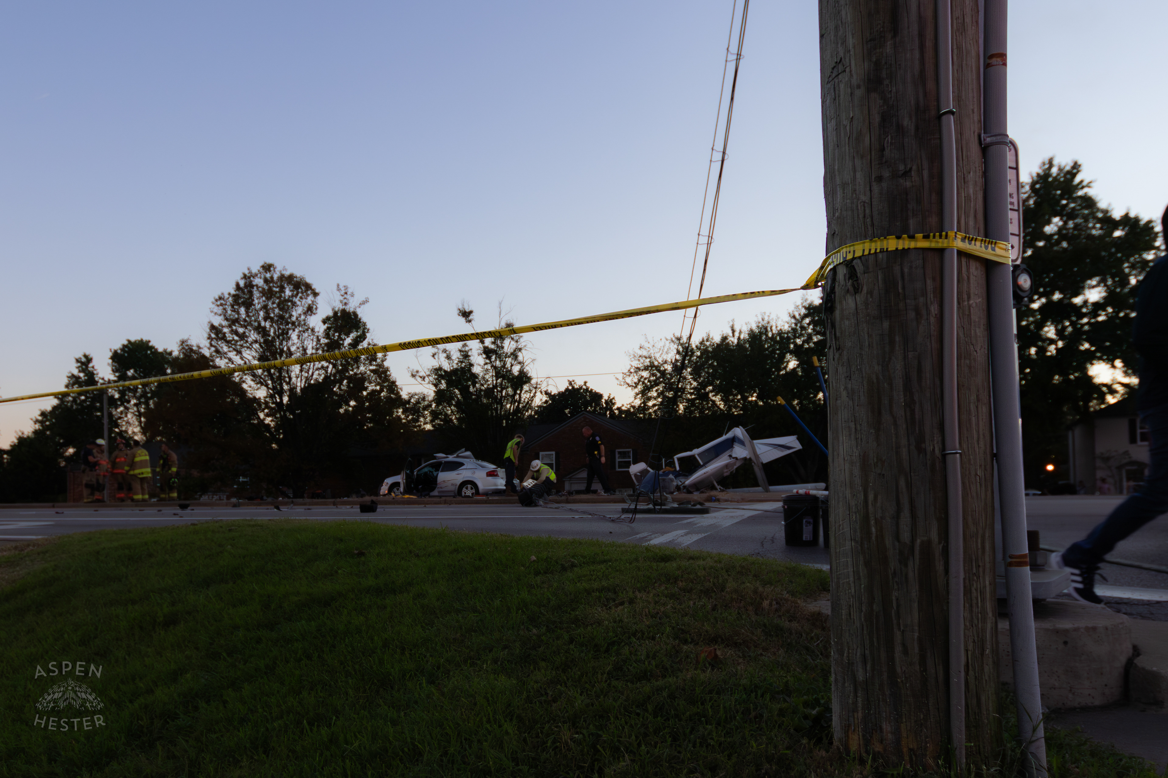 Wreckage in The Intersection after A Piper Cherokee Plane Crash Landed, Taking Out Utility Poles, and Hitting A Car on Breckenridge Lane and Kresge Way. October 11th, 2024/Aspen Hester