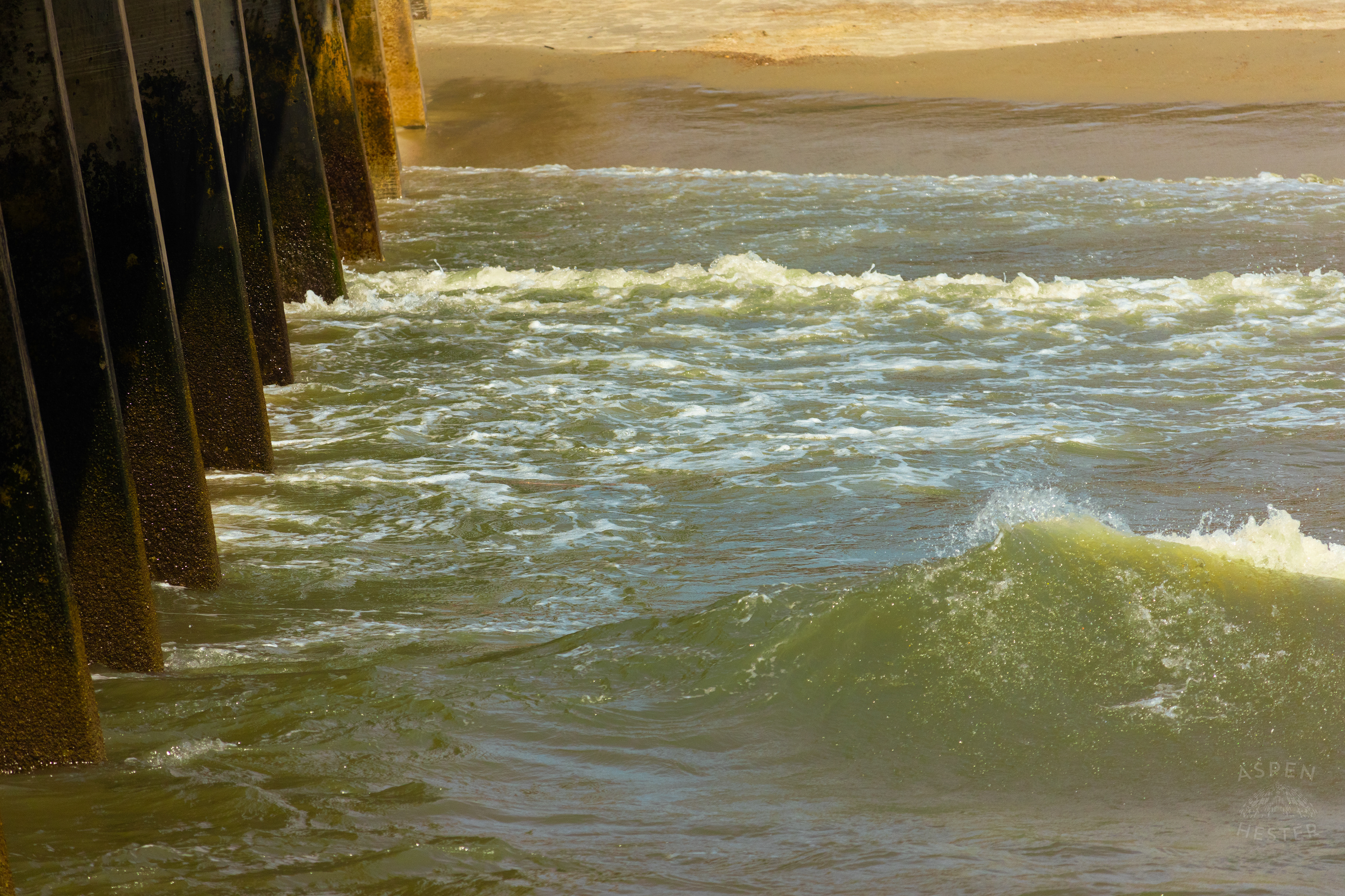 Water Splashing Against The Tybee Island Pier and Pavilion on Tybee Island Georgia. June 27th, 2024/Aspen Hester