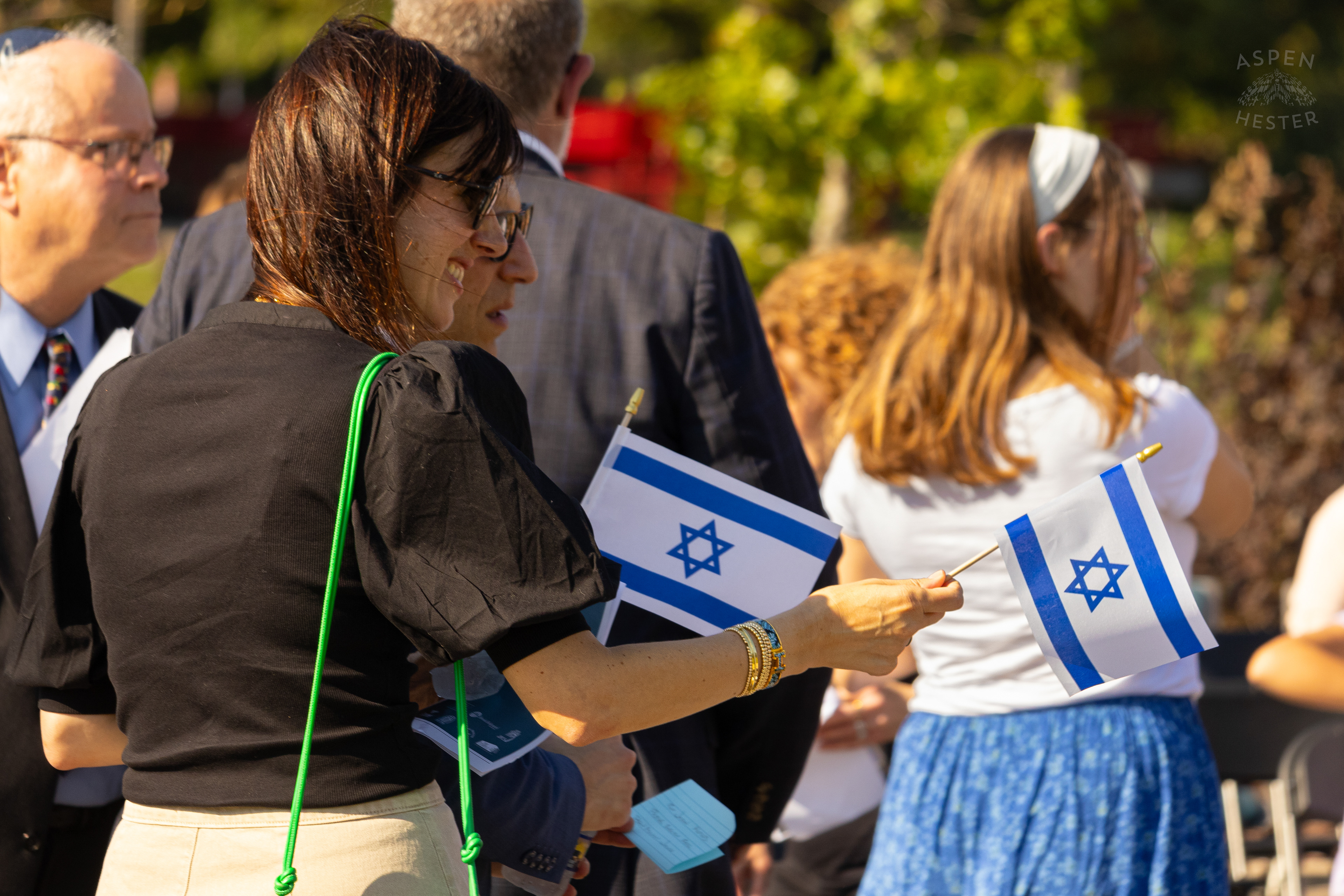 Mayor Craig Greenberg and First Lady Rachel Greenberg Holding Jewish Flags Walk into The Trager Jewish Community Centers Gathering to Remember The Victims and Pray for Peace One Year After The October 7th 2023 Hamas Attack. October 6th, 2024/Aspen Hester