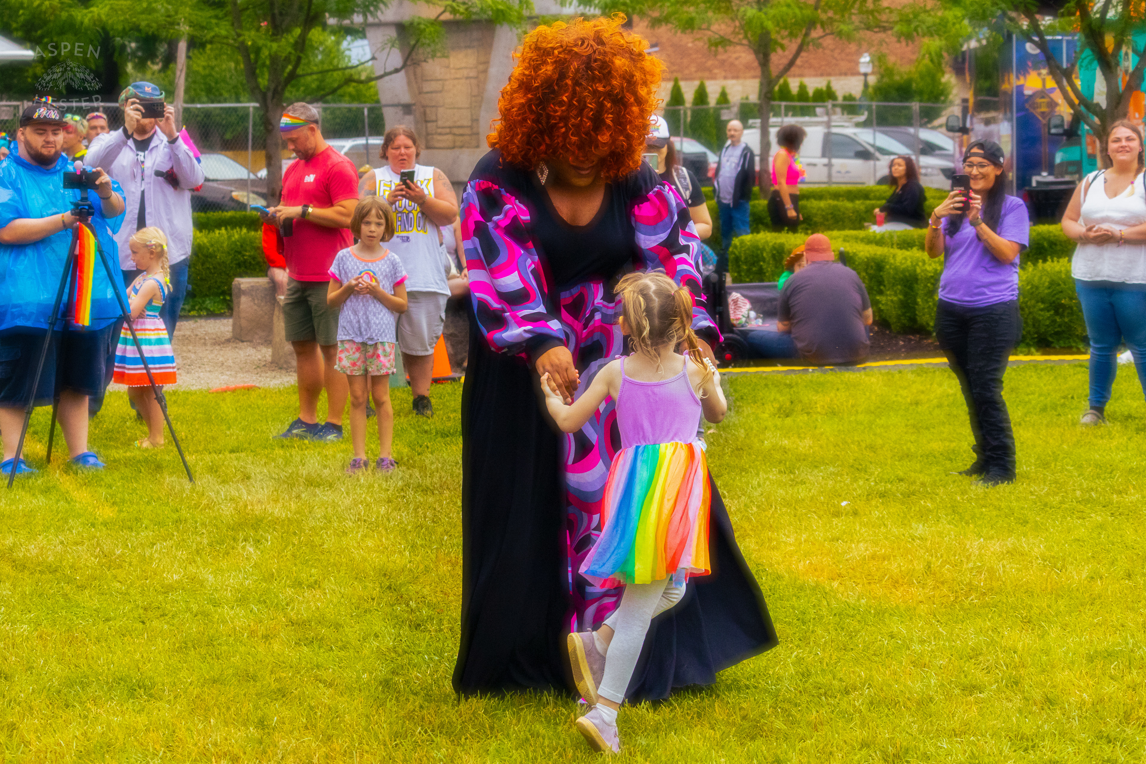 Drag Queen Dancing with A Kid from The Crowd While Performing 'Greatest Love of All' by Whitney Houston During Pride Bar's Family Friendly Drag Show at Southern Indiana Pride. June 1st, 2024/Aspen Hester