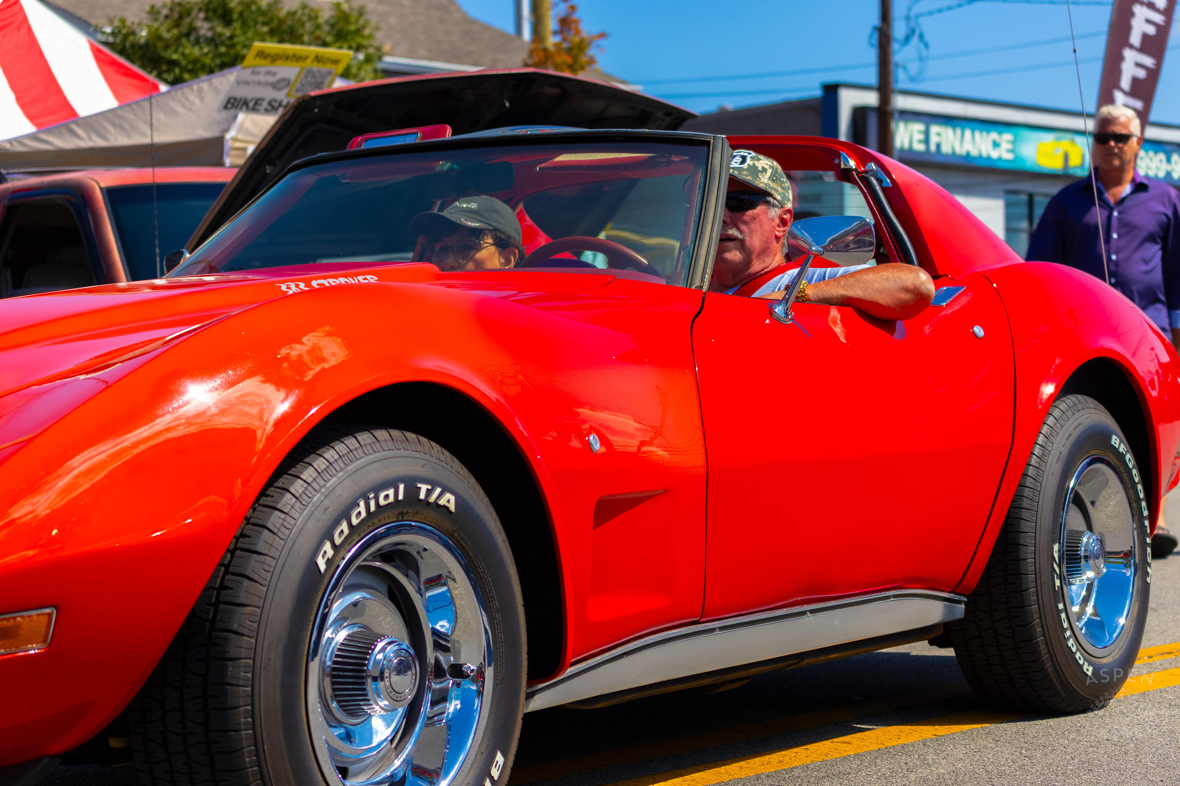A 1970s Chevrolet Corvette Driving Through The 2024 Jeffersontown Gaslight Festival. September 15th, 2024/Aspen Hester