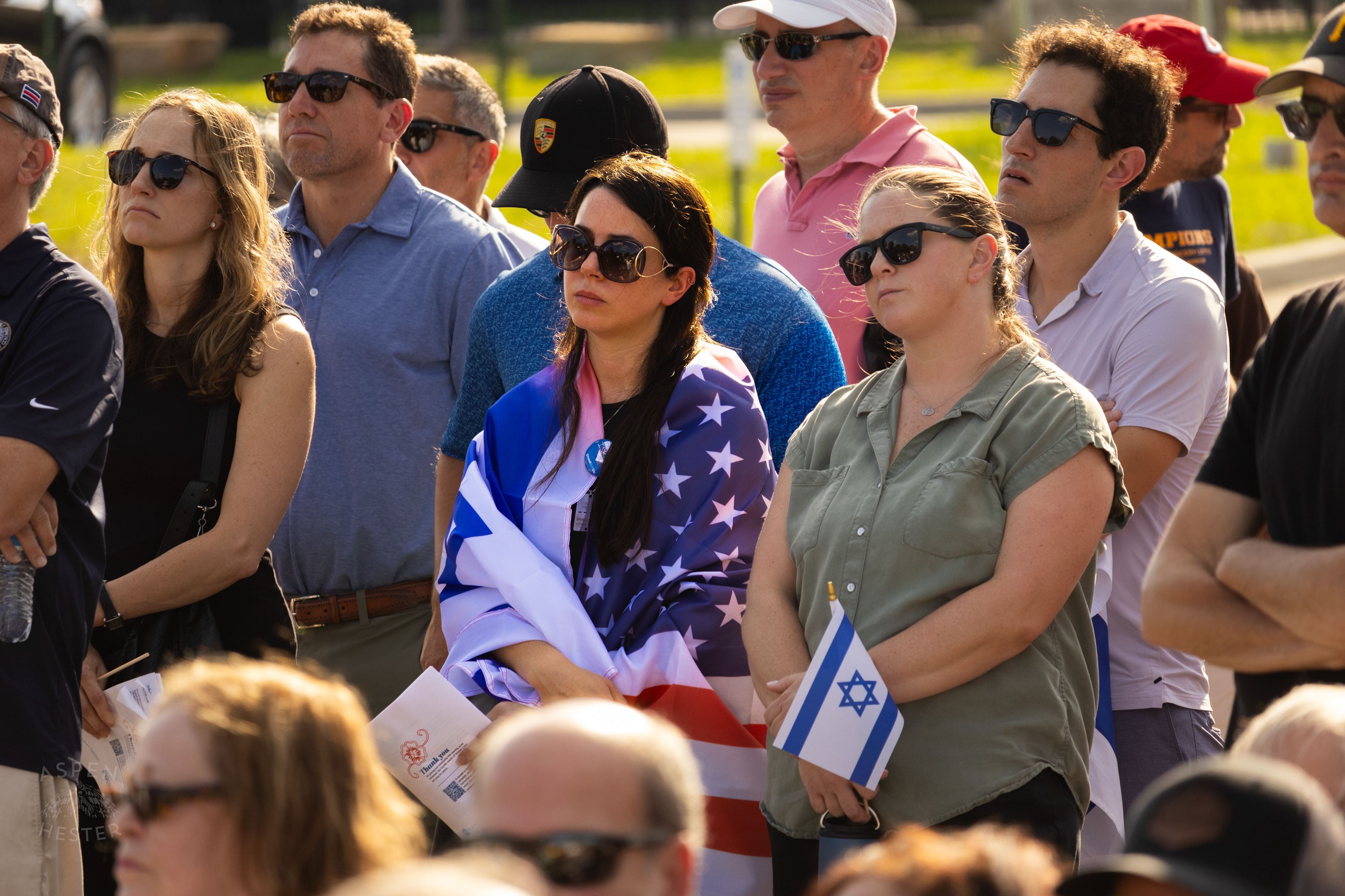 Crowd Member Wearing A Jewish and American Flag at The Trager Jewish Community Centers Gathering to Remember The Victims and Pray for Peace One Year After The October 7th 2023 Hamas Attack. October 6th, 2024/Aspen Hester