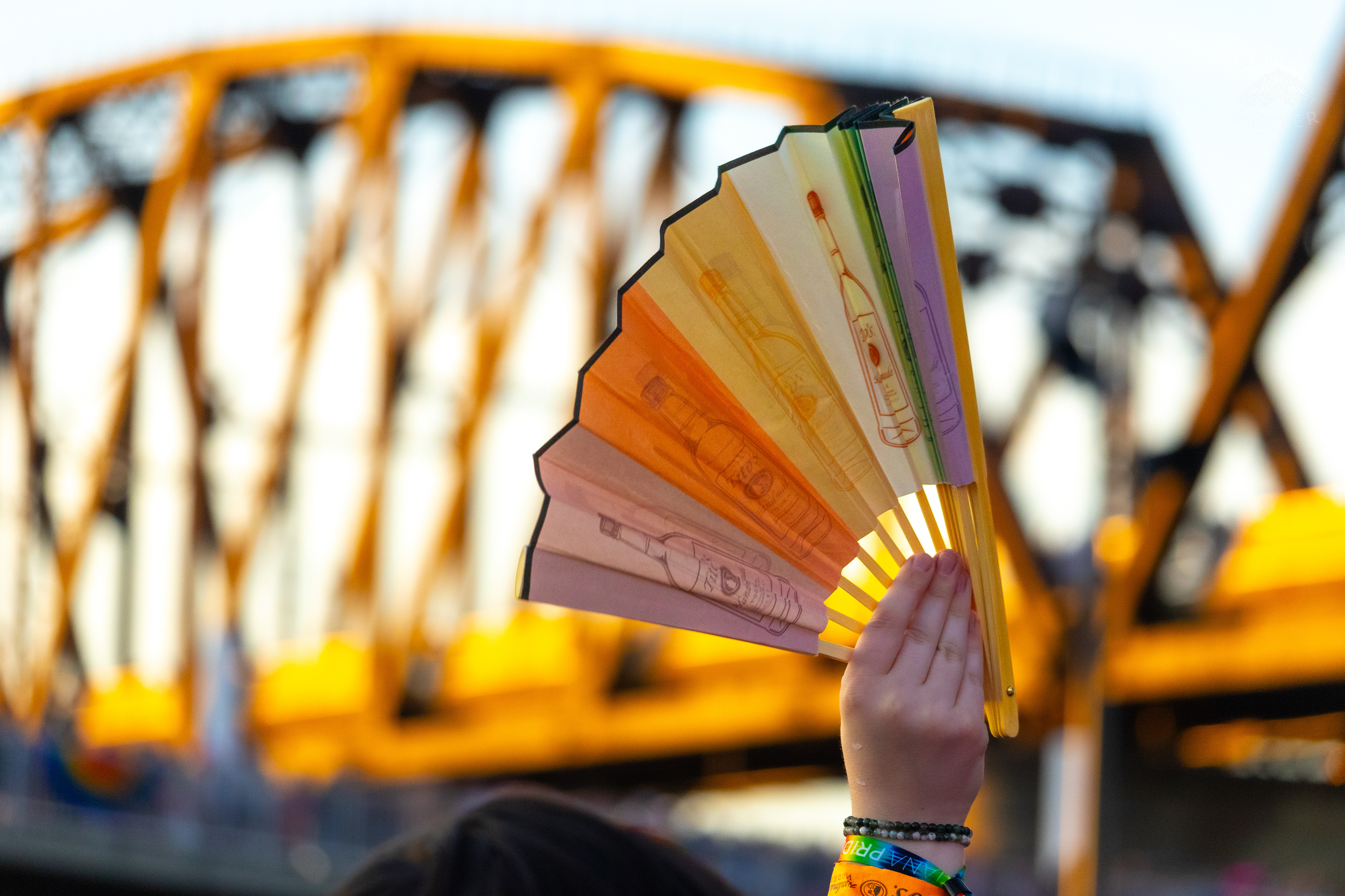 The Big Four Bridge Glows in Gloden Hour Light Over The Kentuckiana Pride Festival. June 15th, 2024/Aspen Hester