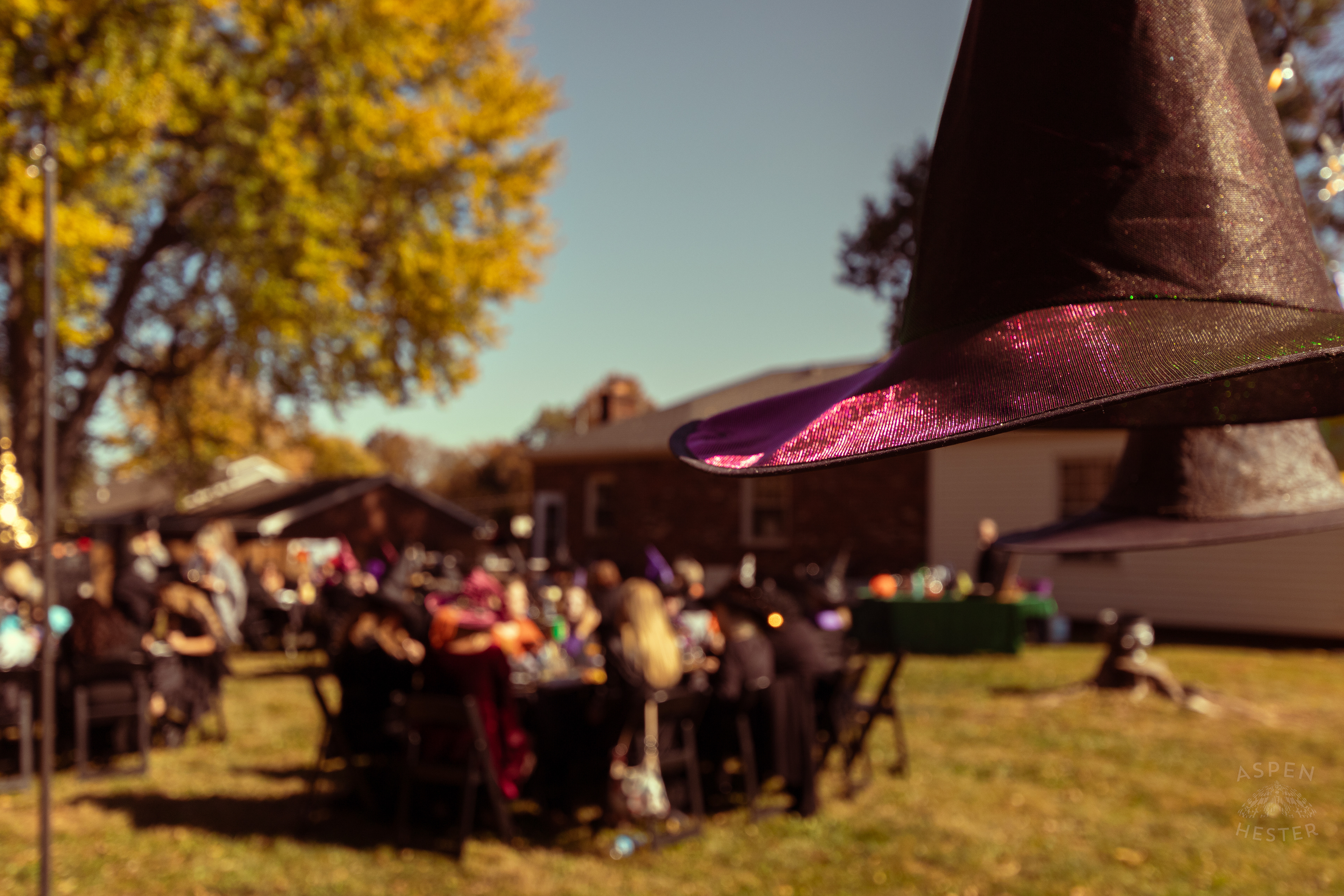Witch Hats Floating Above Dozens of Women Attending Stacey Edrington’s Yearly Witches Brunch in Mt. Washington. October 26th, 2024/Aspen Hester