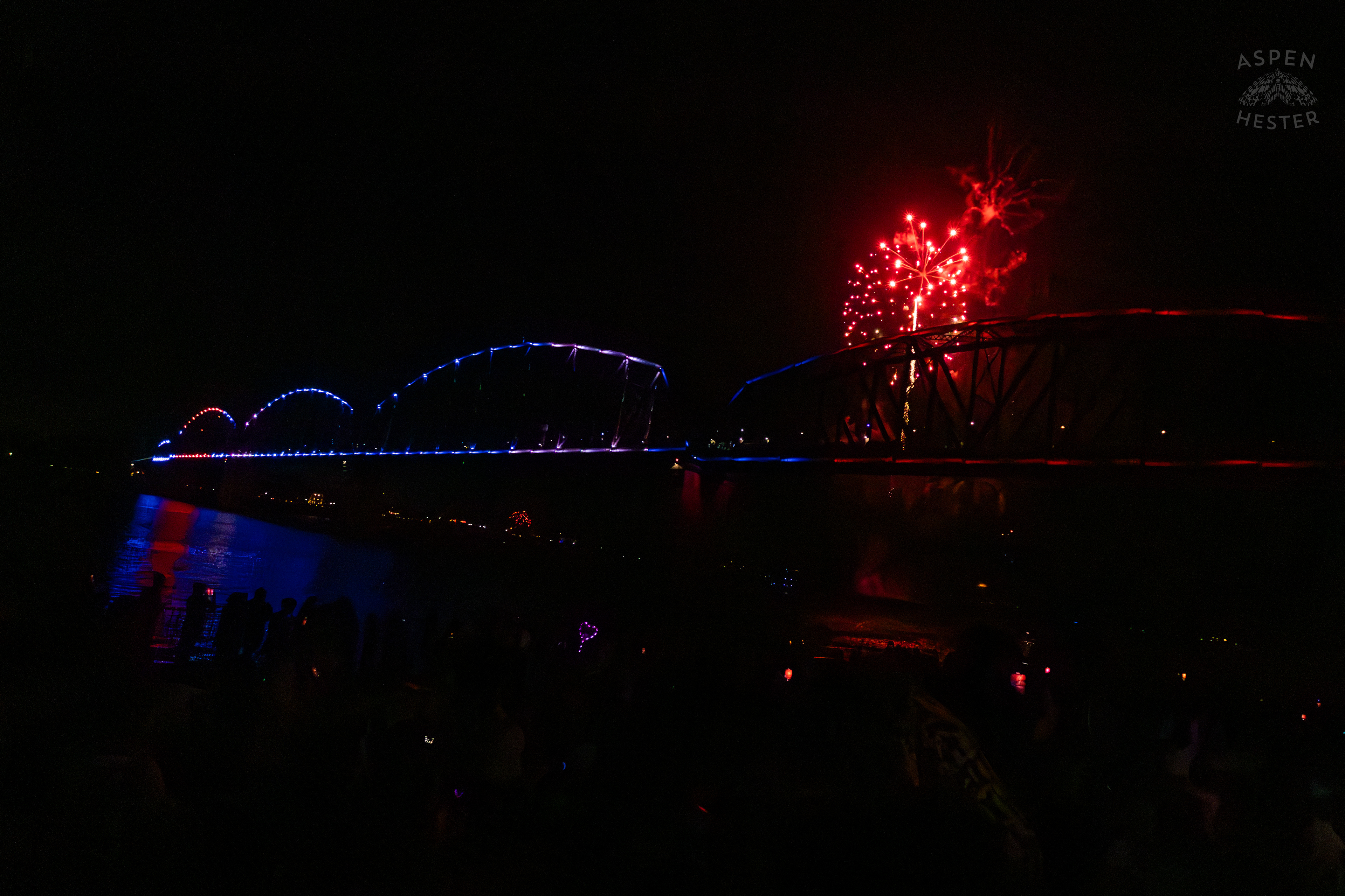 The Big Four Bridge and Attendees During The Fireworks Show at Waterfront Park Fourth of July. July 4th, 2024/Aspen Hester
