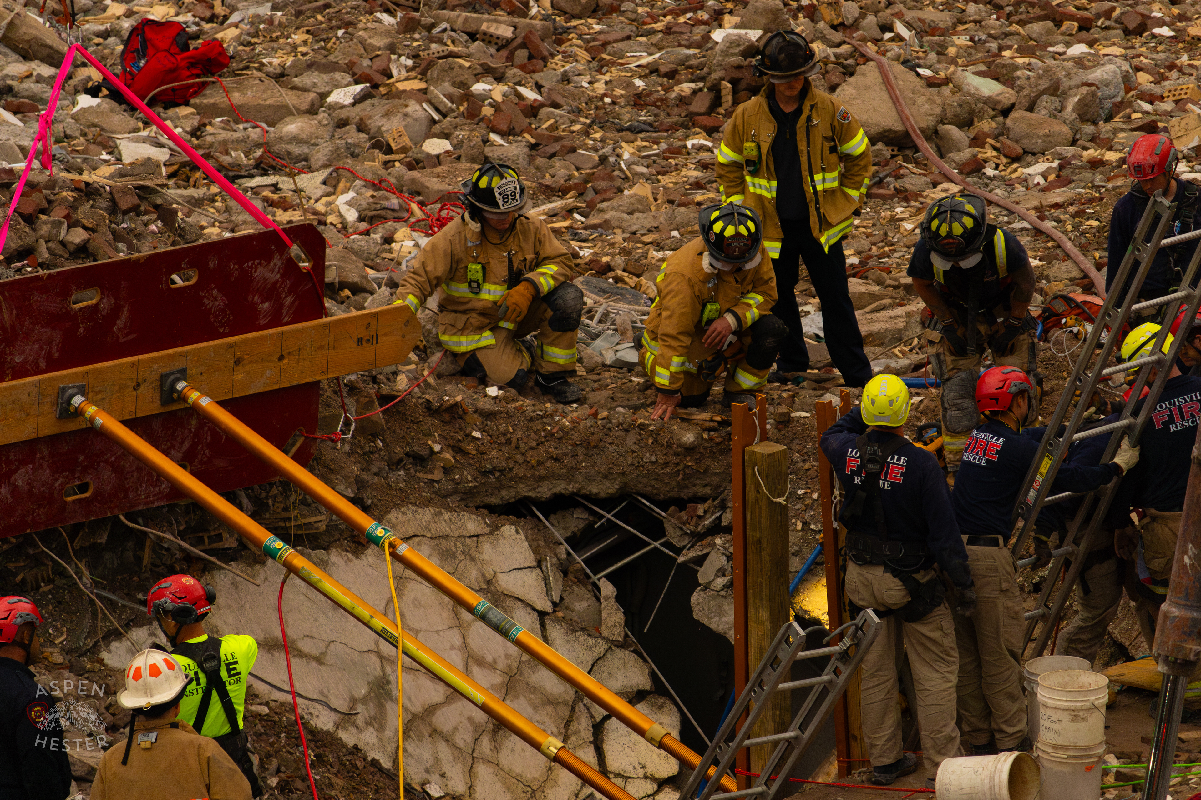 Crew Members Communicate with and Watch Their Crewmates Working Deep Underground During the 8+ Hour LFD Effort to Free A Trapped Demo Worker. November 11th, 2024/Aspen Hester