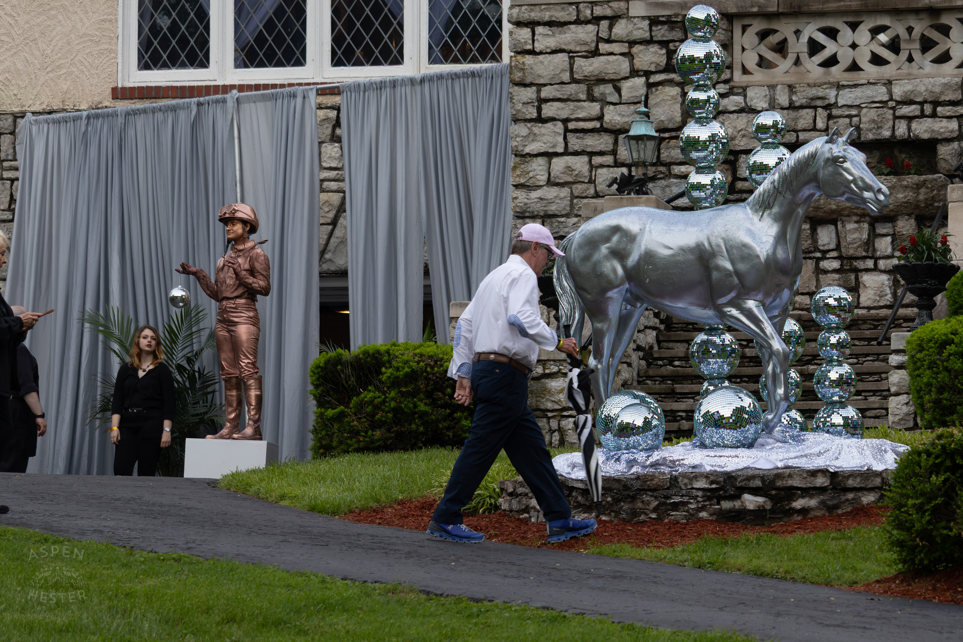 A Copper Jockey Statue Performer and Disco Ball Horse Stand at The Entrance of The 2025 Barnstable-Brown Gala. May 2nd, 2025/Aspen Hester