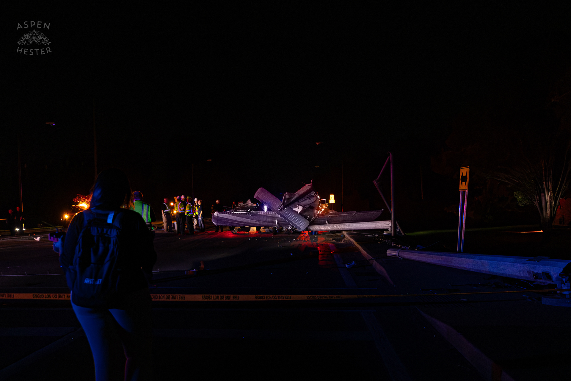 The Piper Cherokee Plane Crumpled after it Crash Landed, Taking Out Utility Poles, and Hitting A Car on Breckenridge Lane and Kresge Way. October 11th, 2024/Aspen Hester 