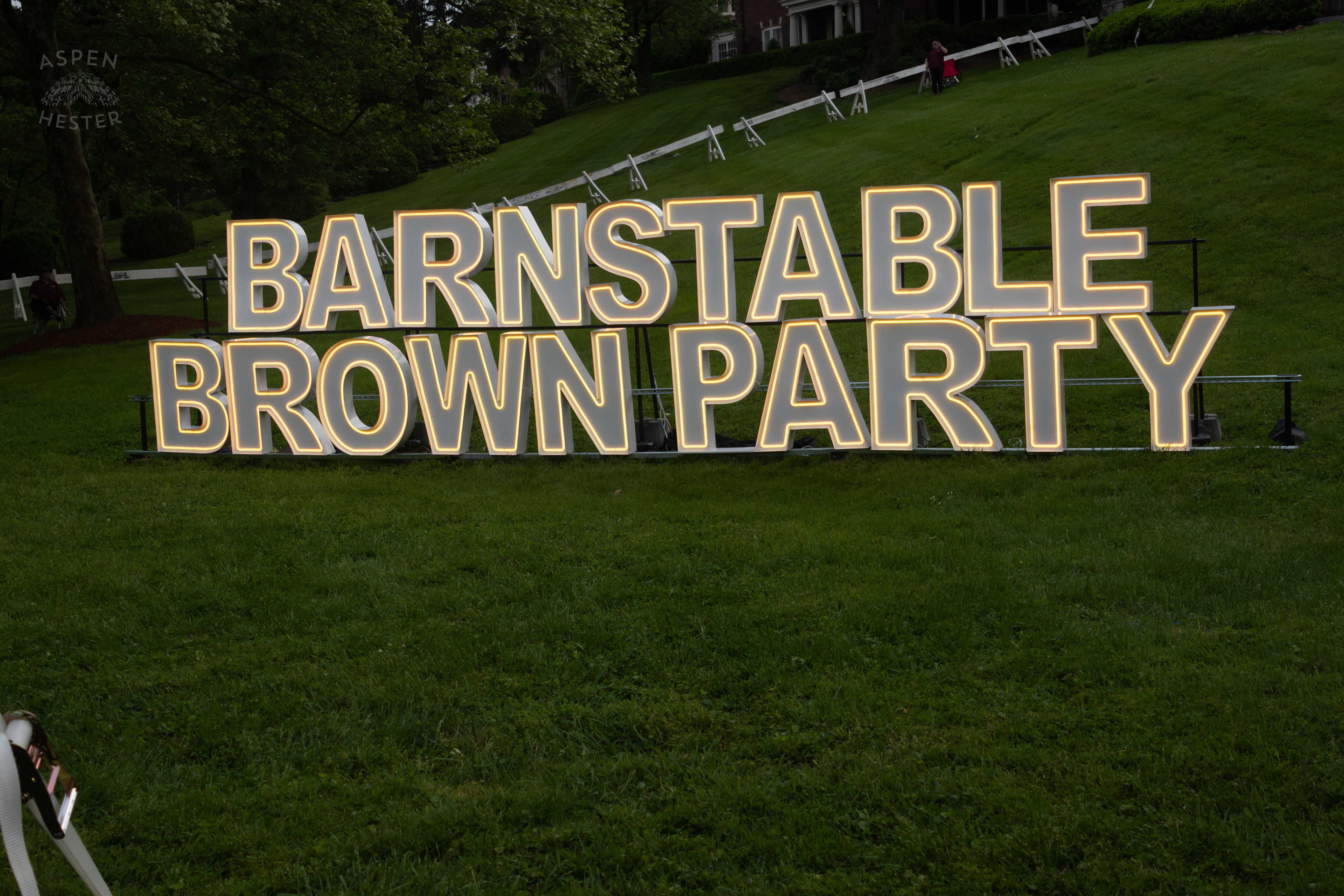 A Neon Sign Lights Up The Yard of The Highlands Mansion for The 2025 Barnstable-Brown Gala. May 2nd, 2025/Aspen Hester