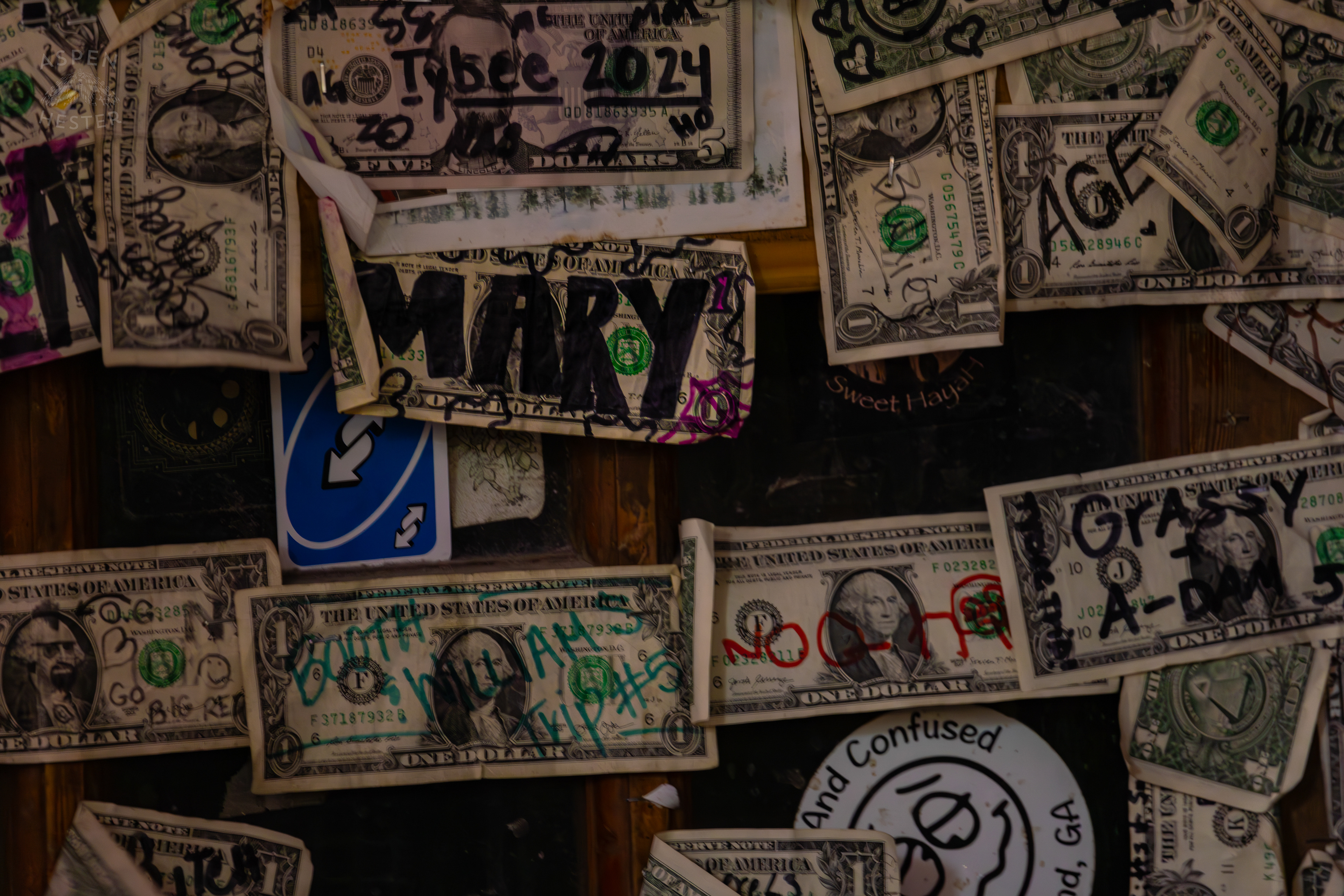 Dollar Bills Stapled to Huc-A-Poos Bites and Booze on Tybee Island Georgia. June 25th, 2024/Aspen Hester