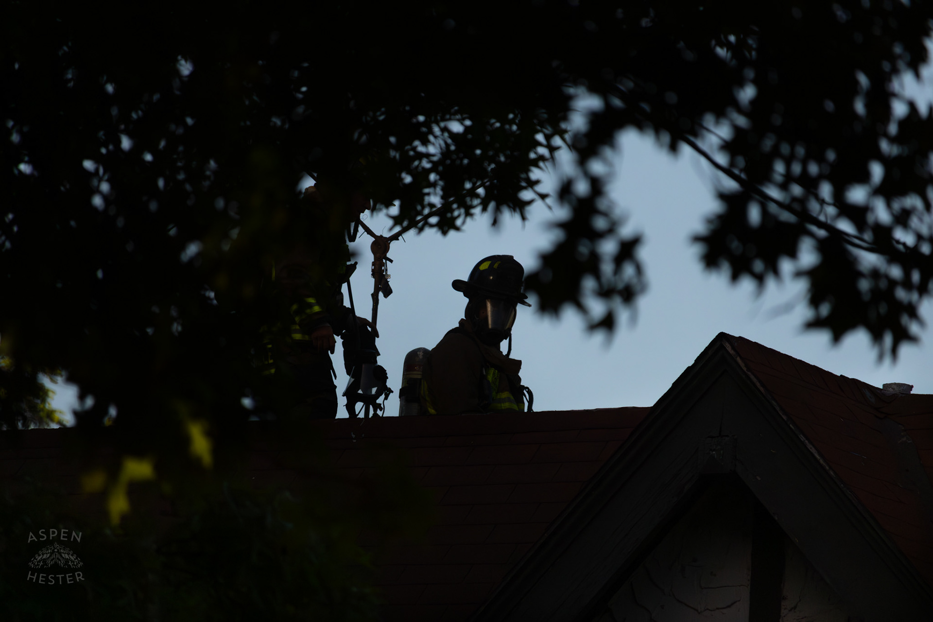 Louisville Firefighter on The Roof of A Burning Building on The Corner of 2nd and Oak Street. June 7th, 2024/Aspen Hester