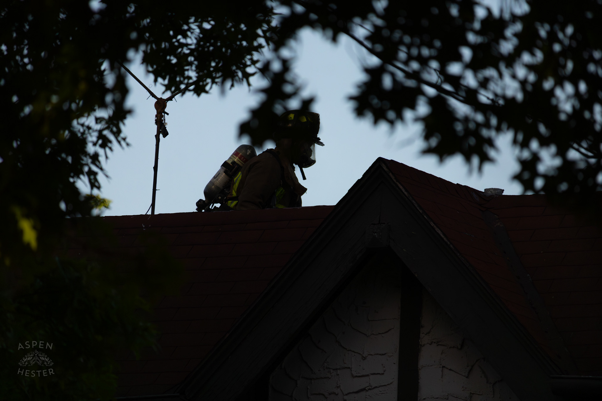 Louisville Firefighter on The Roof of A Burning Building on The Corner of 2nd and Oak Street. June 7th, 2024/Aspen Hester