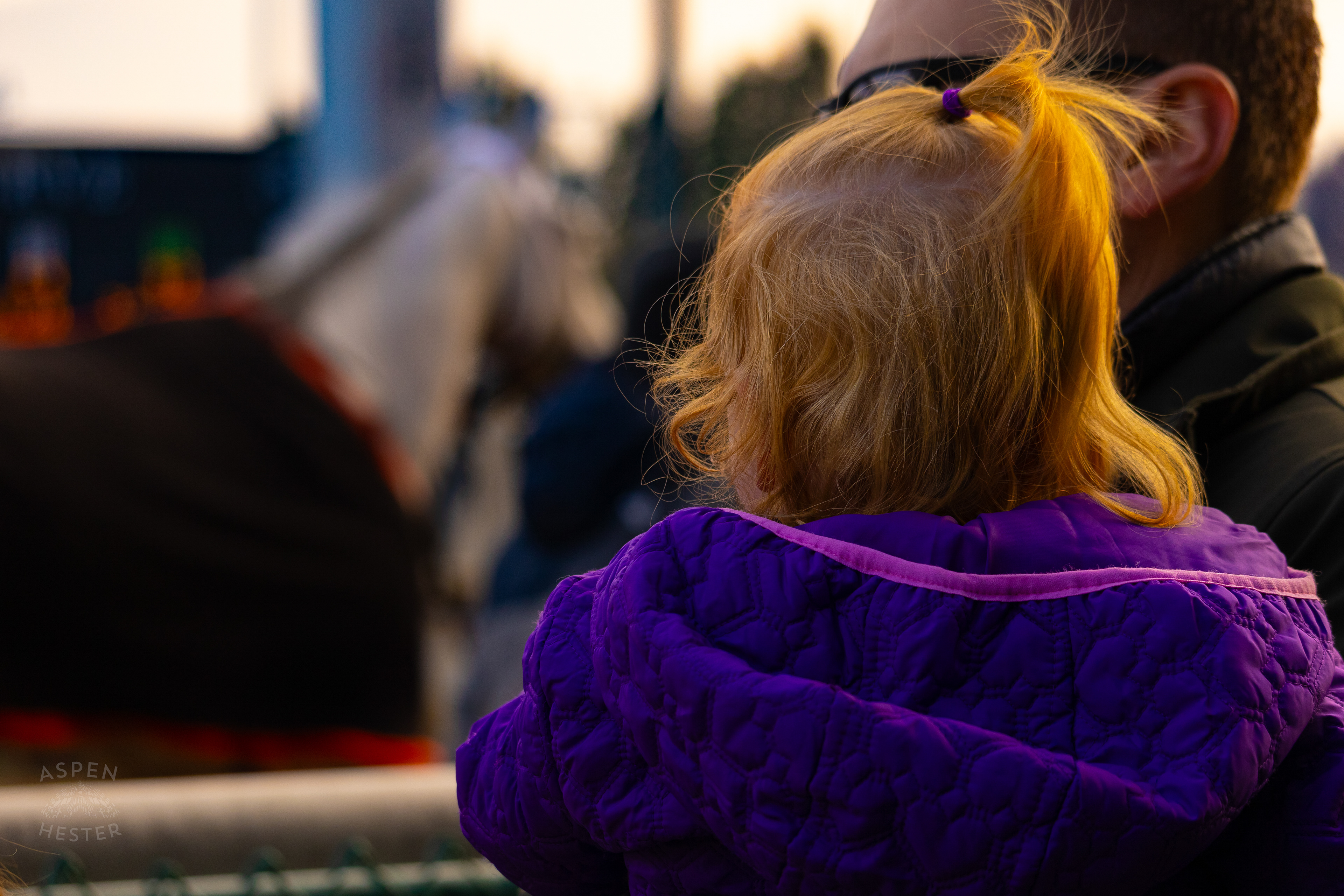 Family Watching The Horses Be Led Back to The Stables After Running in Race 10 During The Thanksgiving Day Festivities At Churchill Downs. November 28th, 2024/Aspen Hester