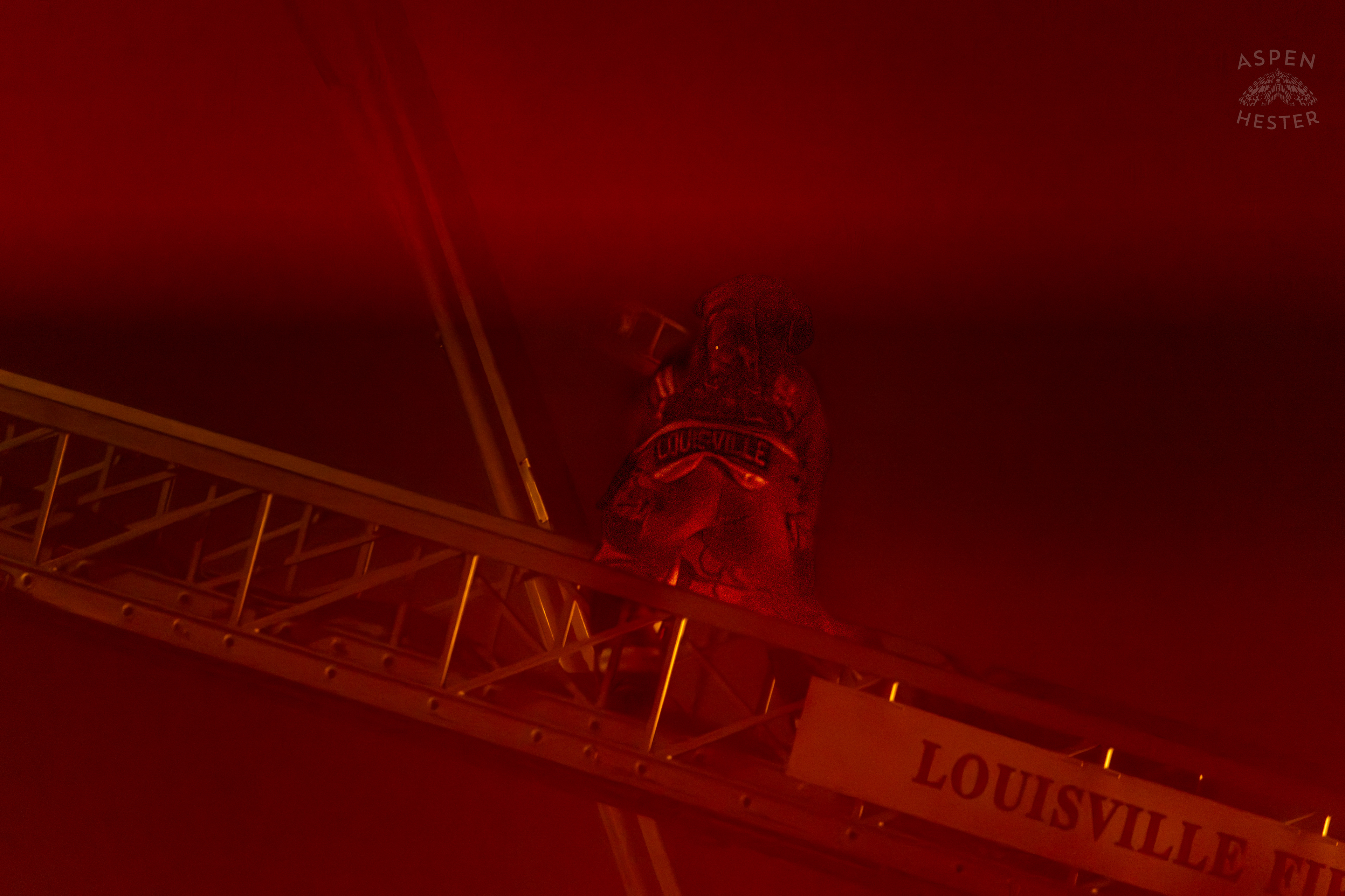 Firefighter Climbing an Aerial to Battle the Massive 3 Alarm Blaze Engulfing The Vacant St. Paul's German Evangelical Church on East Broadway. October 9th, 2024/Aspen Hester