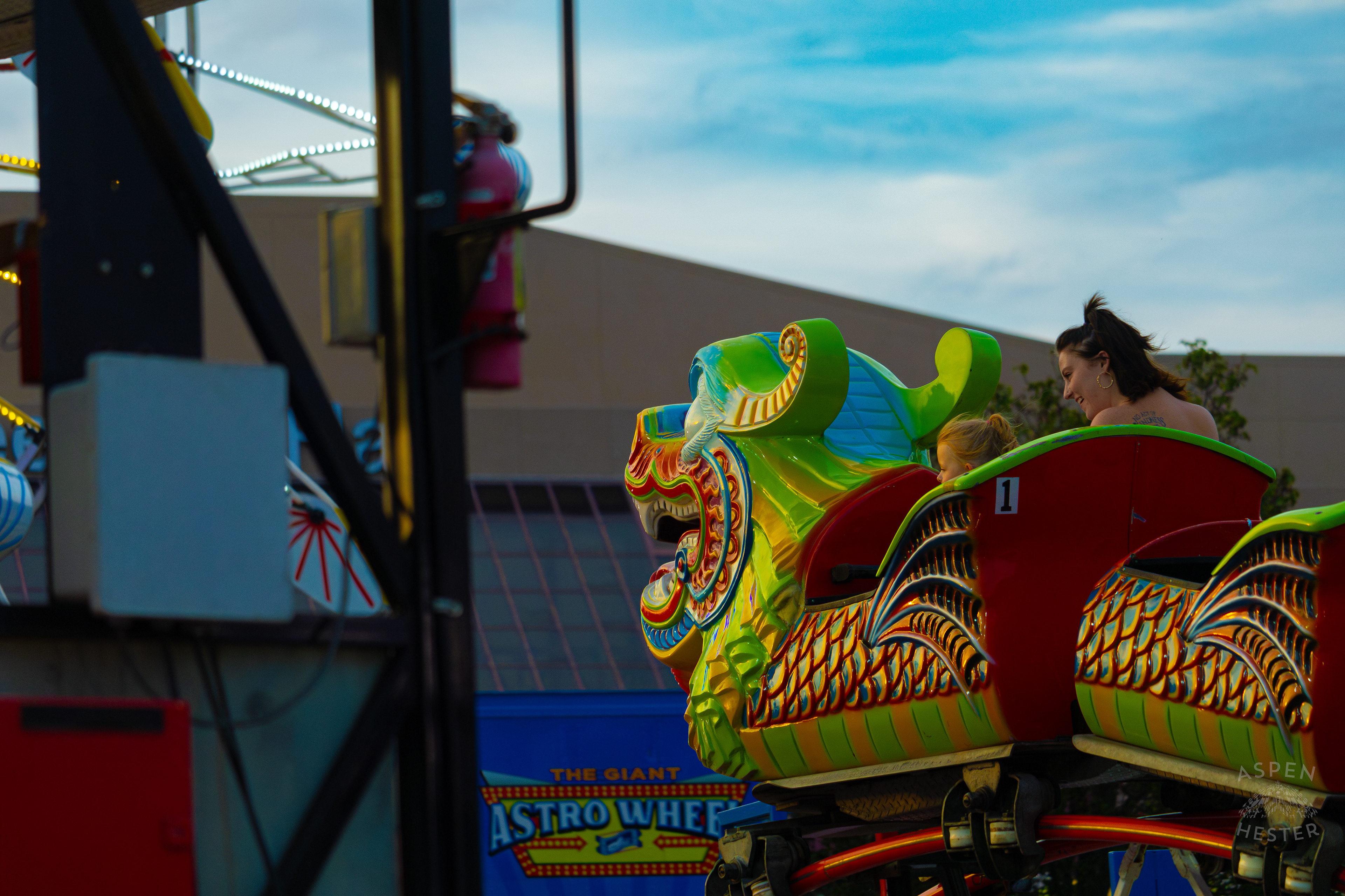 Two Fair Goers Enjoy The "Oriental Express" at The 120th Kentucky State Fair at Sundown. July 15th, 2024/Aspen Hester