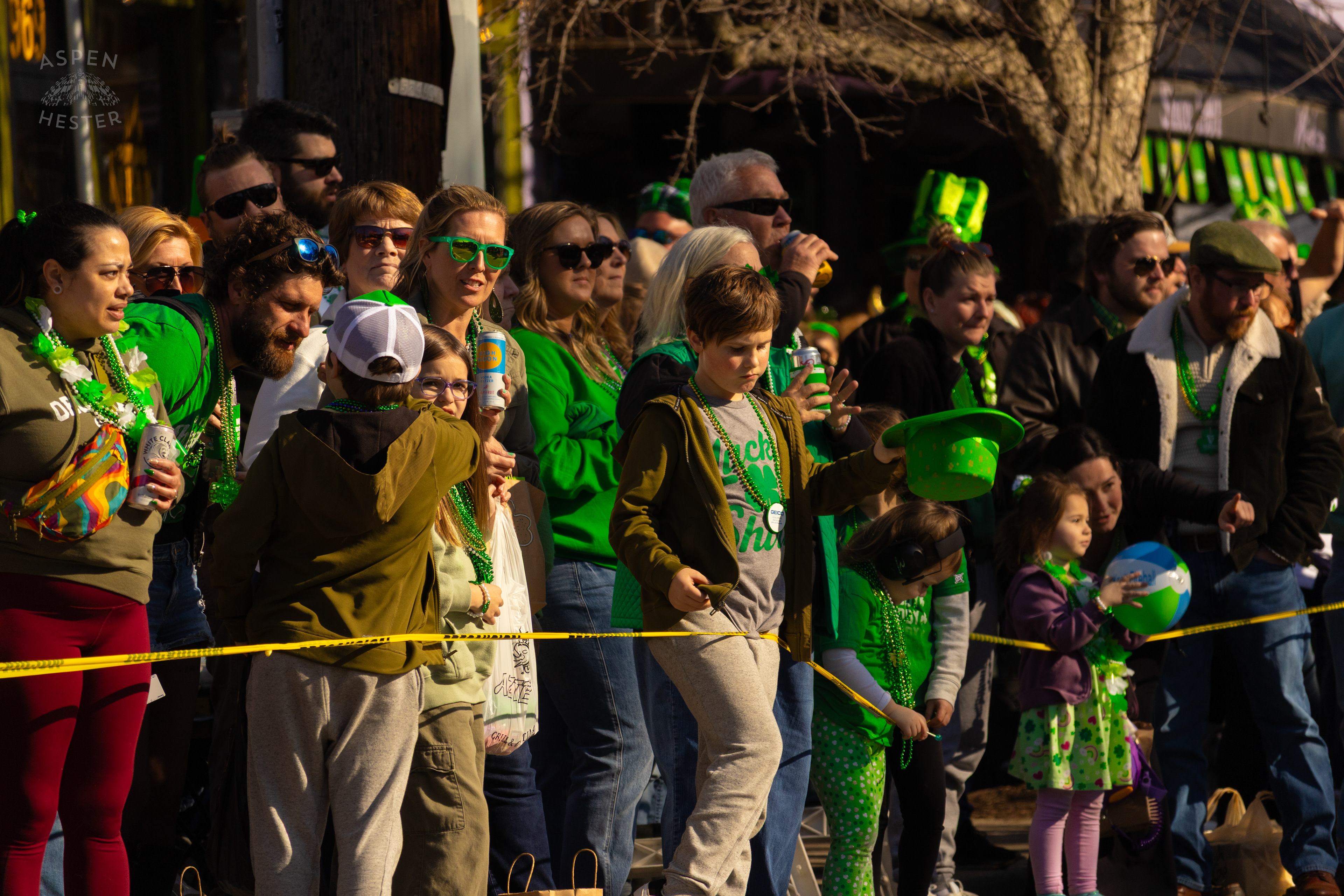 Decked Out Spectators Watch as The 52nd Annual Saint Patrick’s Day Parade Rolls Through The Highlands. March 8th, 2025/Aspen Hester