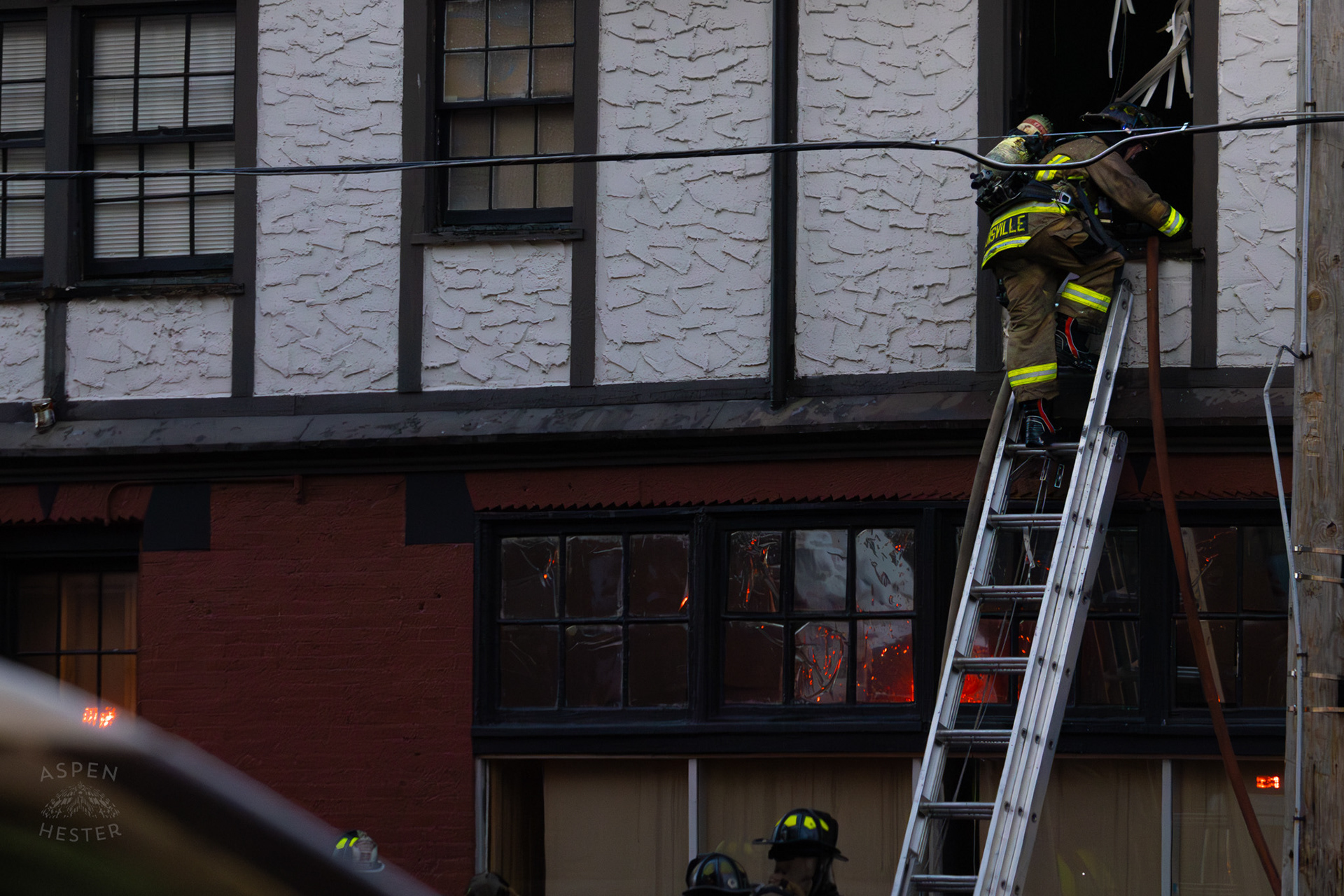 Louisville Firefighter Entering Burning Building on The Corner of 2nd and Oak Street. June 7th, 2024/Aspen Hester