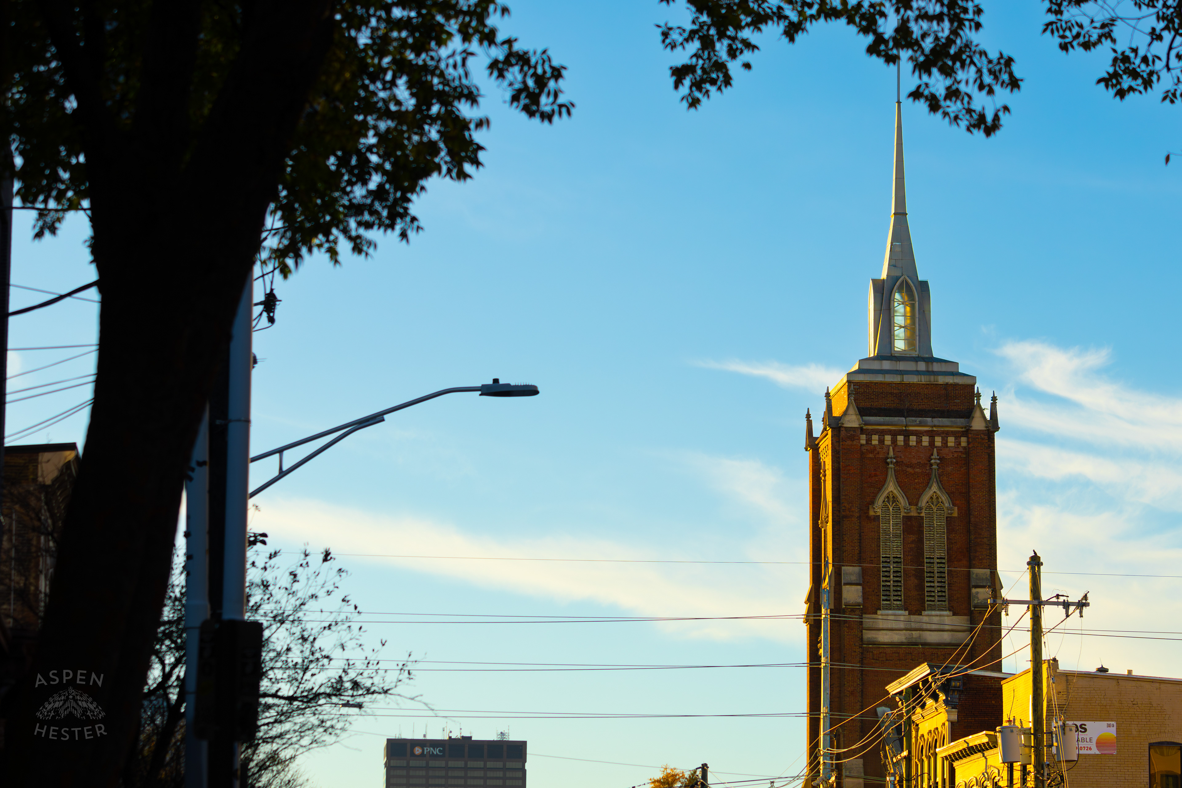 The Steeple of St. John United Church of Christ Against The Sky In Nulu on A Saturday Evening. November 14th, 2024/Aspen Hester