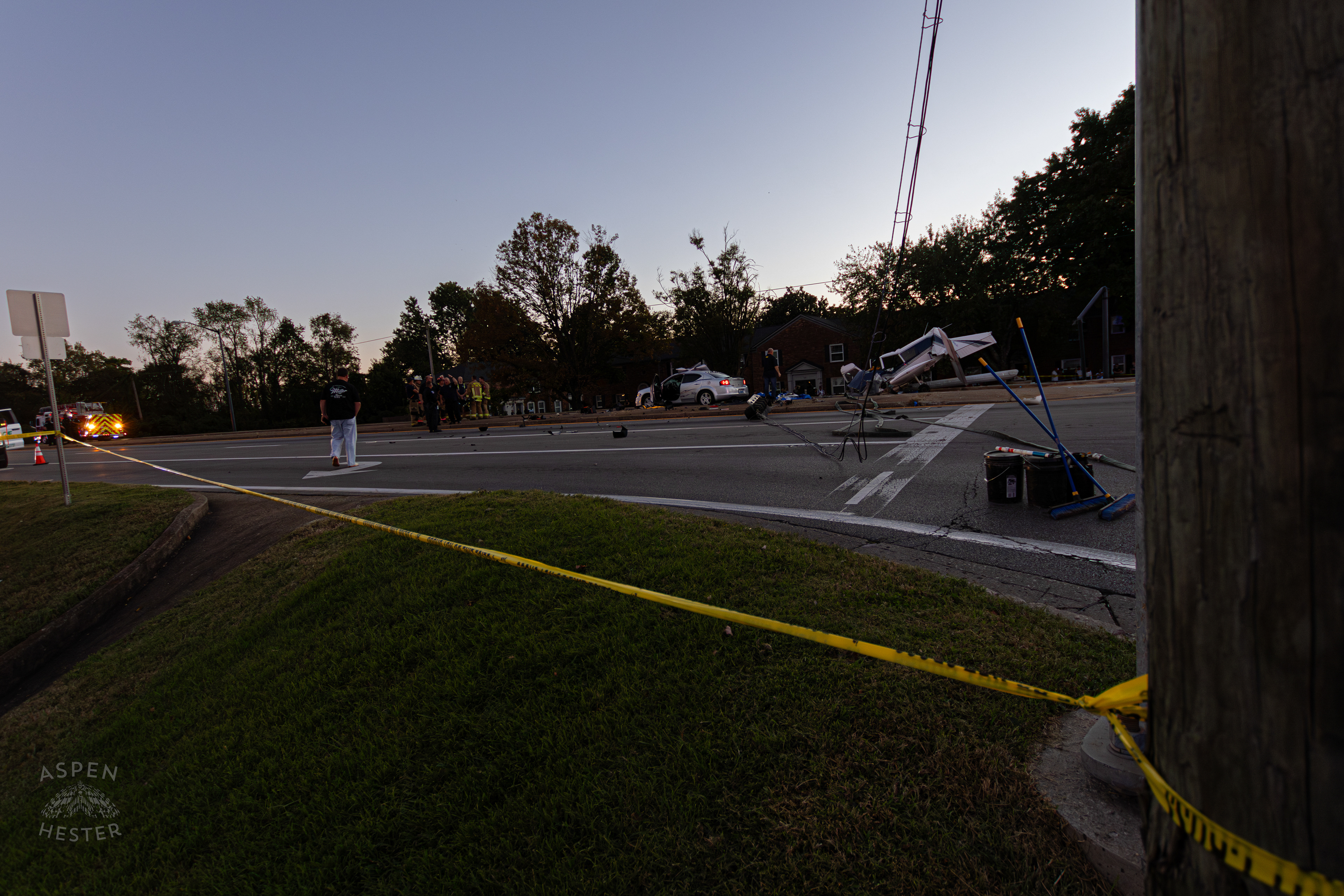 Crime Scene Tape Marking Where A Piper Cherokee Plane Crash Landed, Taking Out Utility Poles, and Hitting A Car on Breckenridge Lane and Kresge Way. October 11th, 2024/Aspen Hester 